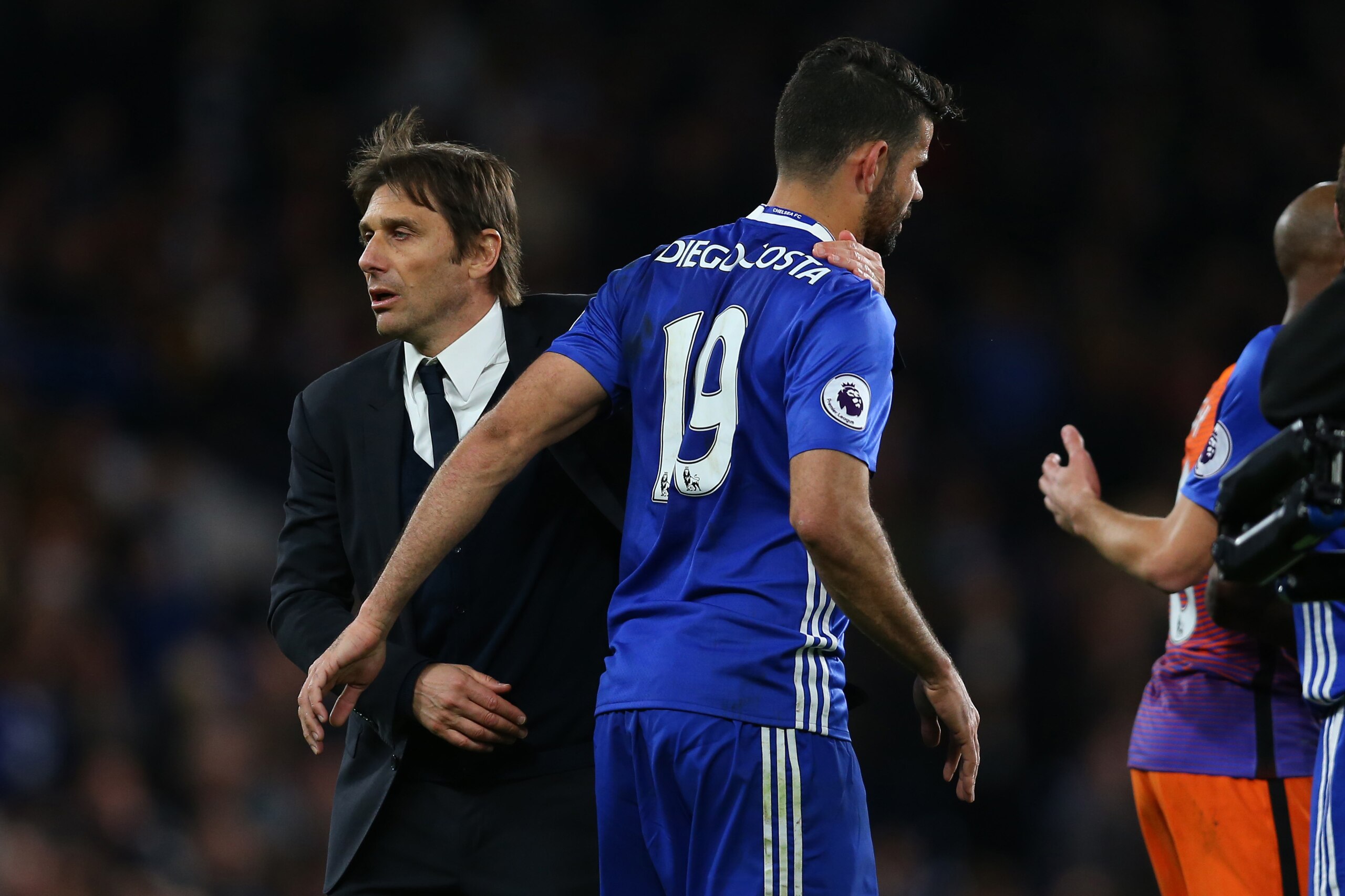 LONDON, ENGLAND - APRIL 05: Antonio Conte manager / head coach of Chelsea and Diego Costa of Chelsea after the Premier League match between Chelsea and Manchester City at Stamford Bridge on April 5, 2017 in London, England. (Photo by Catherine Ivill - AMA
