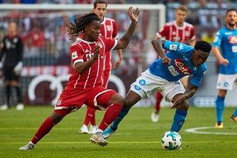 MUNICH, GERMANY - AUGUST 02: Renato Sanches of Bayern Muenchen and Amadou Diawara of Napoli battle for the ball during the Audi Cup 2017 match between SSC Napoli and FC Bayern Muenchen at Allianz Arena on August 2, 2017 in Munich, Germany. (Photo by TF-Im