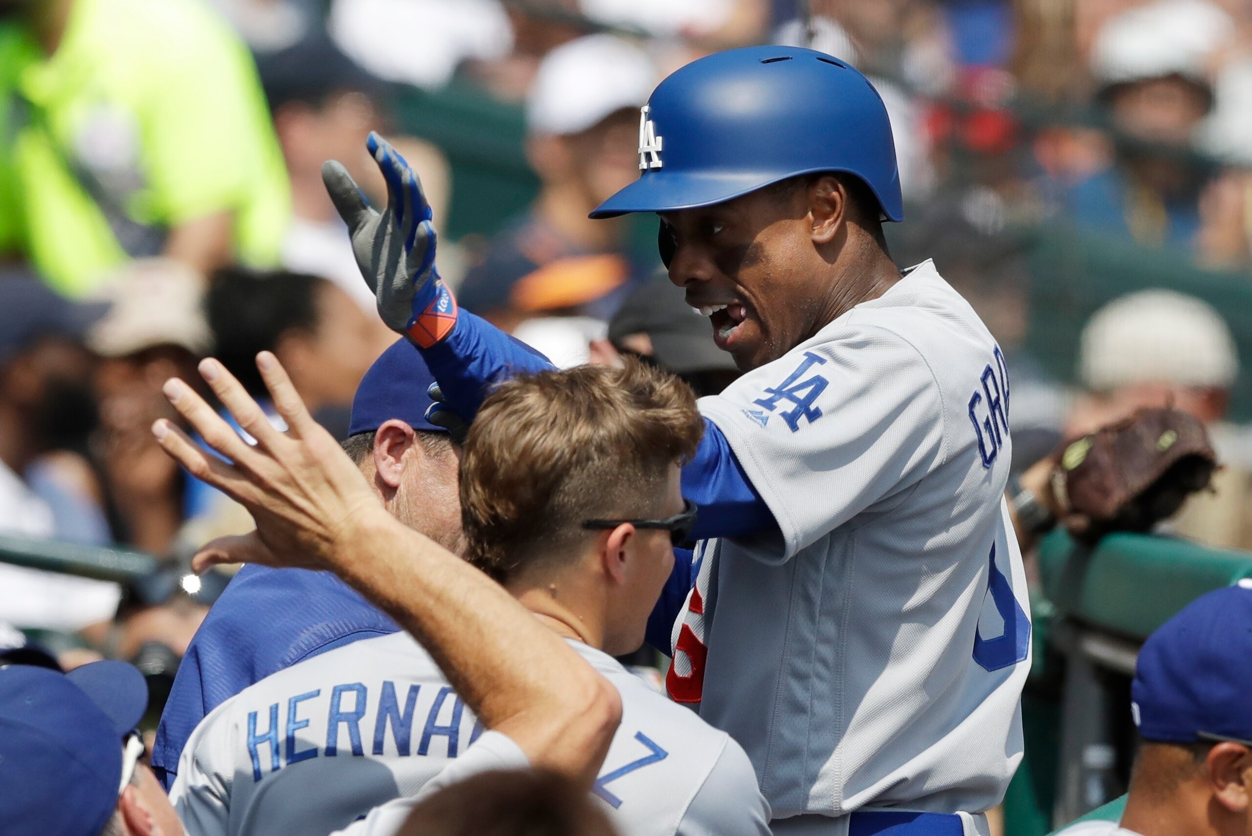 Curtis Granderson celebrates with this Dodger teammates.