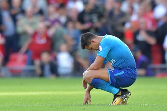 Arsenal's Chilean striker Alexis Sanchez reacts during the English Premier League football match between Liverpool and Arsenal at Anfield in Liverpool, north west England on August 27, 2017. / AFP PHOTO / Anthony Devlin / RESTRICTED TO EDITORIAL USE. No u