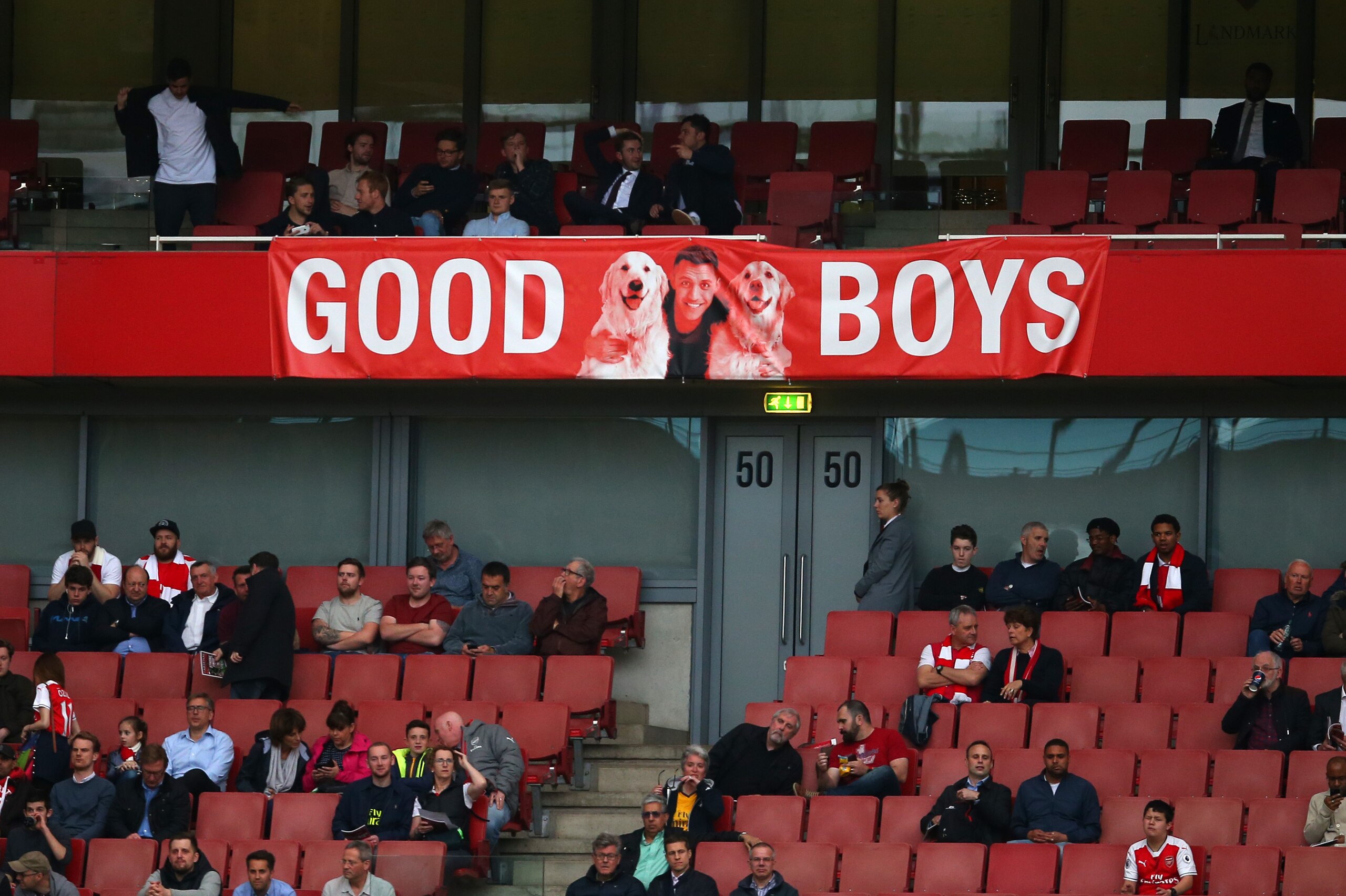 LONDON, ENGLAND - MAY 16: A banner showing a picture of Alexis Sanchez of Arsenal and his dogs during the Premier League match between Arsenal and Sunderland at Emirates Stadium on May 16, 2017 in London, England. (Photo by Catherine Ivill - AMA/Getty Ima