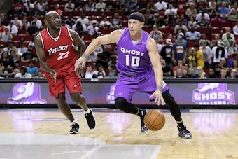 SEATTLE, WA - AUGUST 20:  Mike Bibby #10 of the Ghost Ballers handles the ball in front Dion Glover #22 of the Trilogy in week nine of the BIG3 three-on-three basketball league at KeyArena on August 20, 2017 in Seattle, Washington.  (Photo by Christian Pe