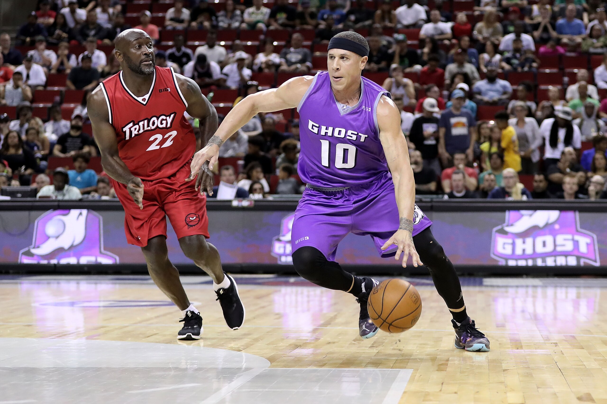 SEATTLE, WA - AUGUST 20:  Mike Bibby #10 of the Ghost Ballers handles the ball in front Dion Glover #22 of the Trilogy in week nine of the BIG3 three-on-three basketball league at KeyArena on August 20, 2017 in Seattle, Washington.  (Photo by Christian Pe