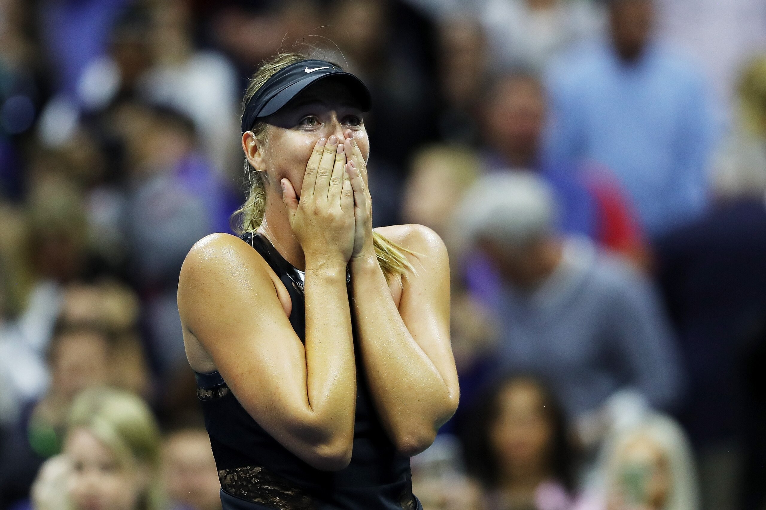 NEW YORK, NY - AUGUST 28:  Maria Sharapova of Russia celebrates winning her first round Women's Singles match against Simona Halep of Romania on Day One of the 2017 US Open at the USTA Billie Jean King National Tennis Center on August 28, 2017 in the Flus
