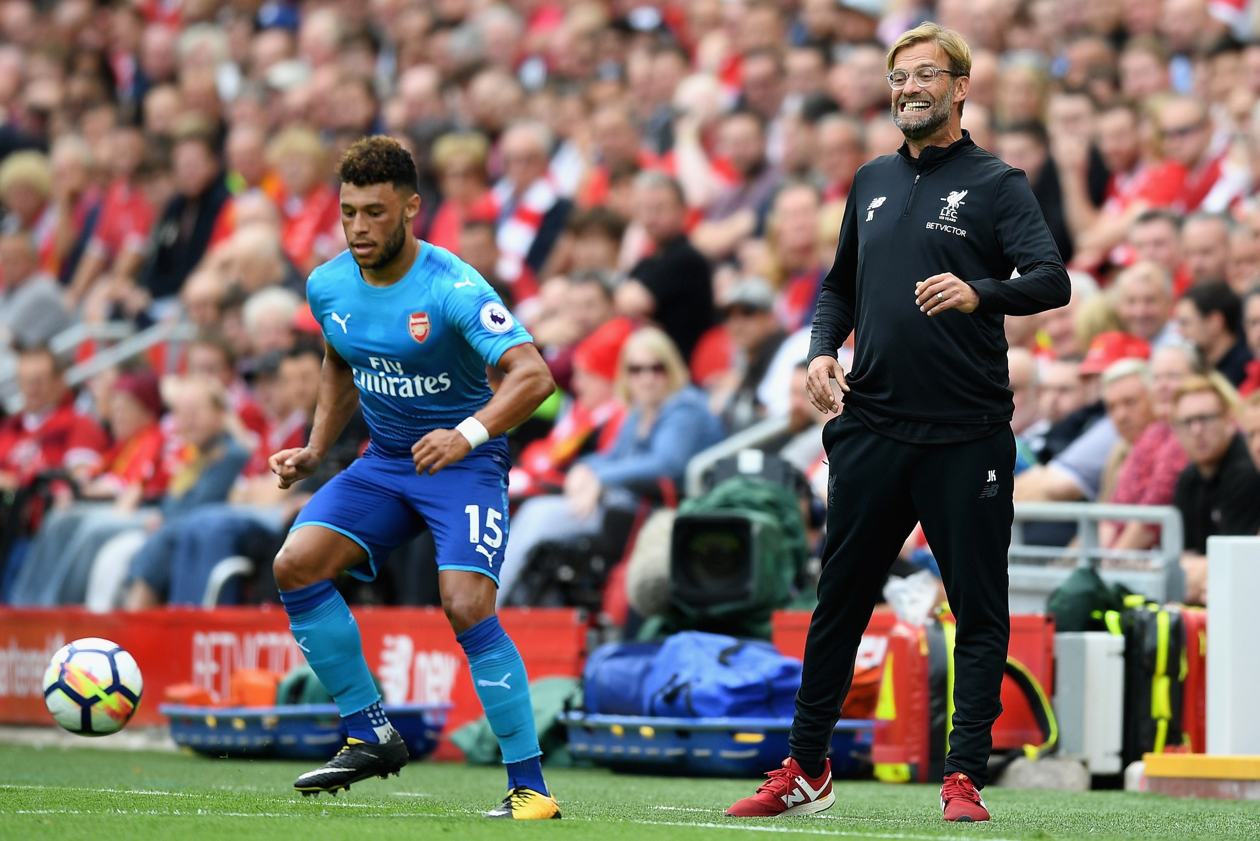 LIVERPOOL, ENGLAND - AUGUST 27: Jurgen Klopp, Manager of Liverpool reacts as Alex Oxlade-Chamberlain of Arsenal controls the ball during the Premier League match between Liverpool and Arsenal at Anfield on August 27, 2017 in Liverpool, England.  (Photo by