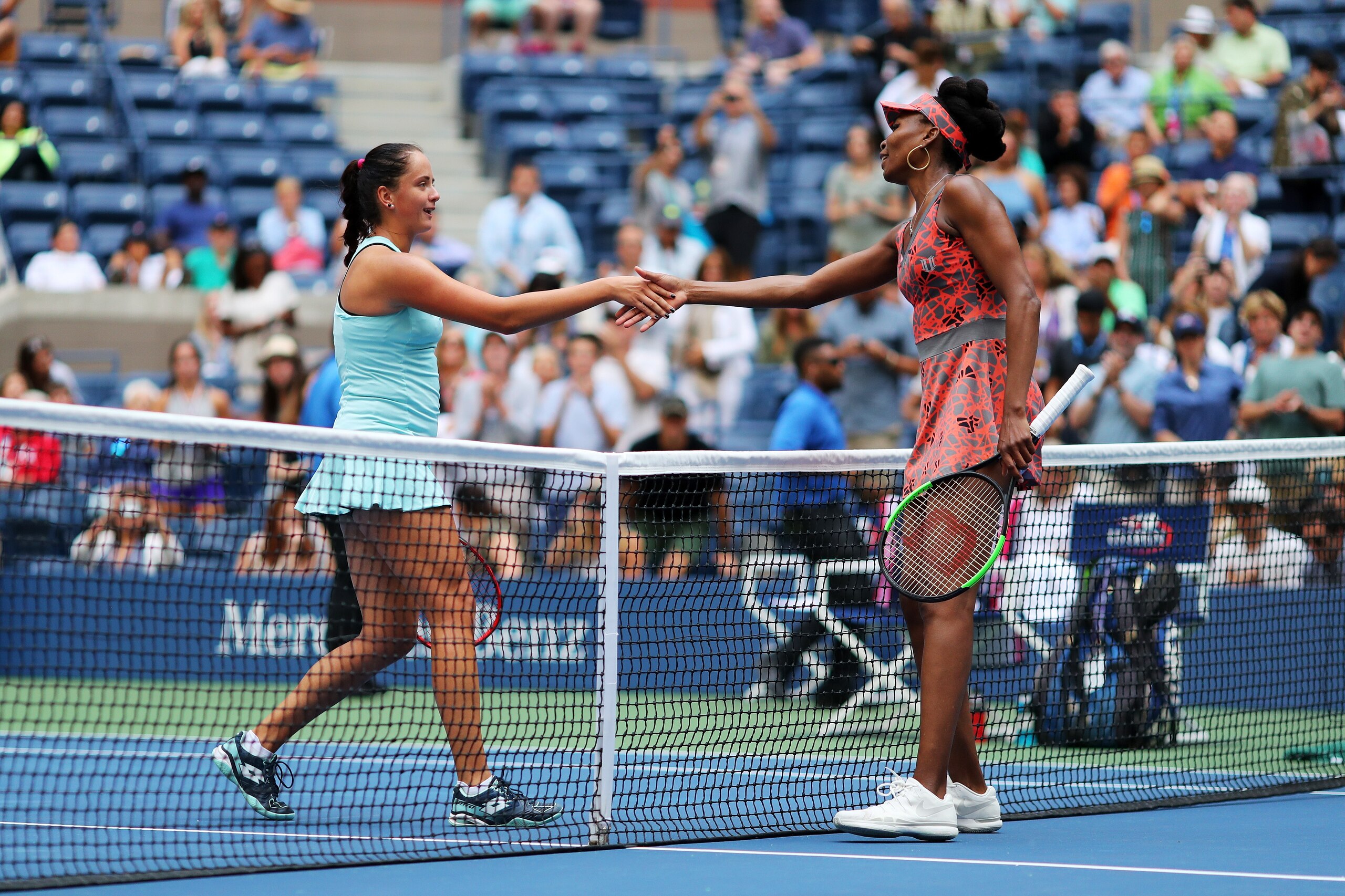 NEW YORK, NY - AUGUST 28:  Venus Williams of the United States shakes hands with Viktoria Kuzmova of Slovakia (L) after their first round Women's Singles match on Day One of the 2017 US Open at the USTA Billie Jean King National Tennis Center on August 28