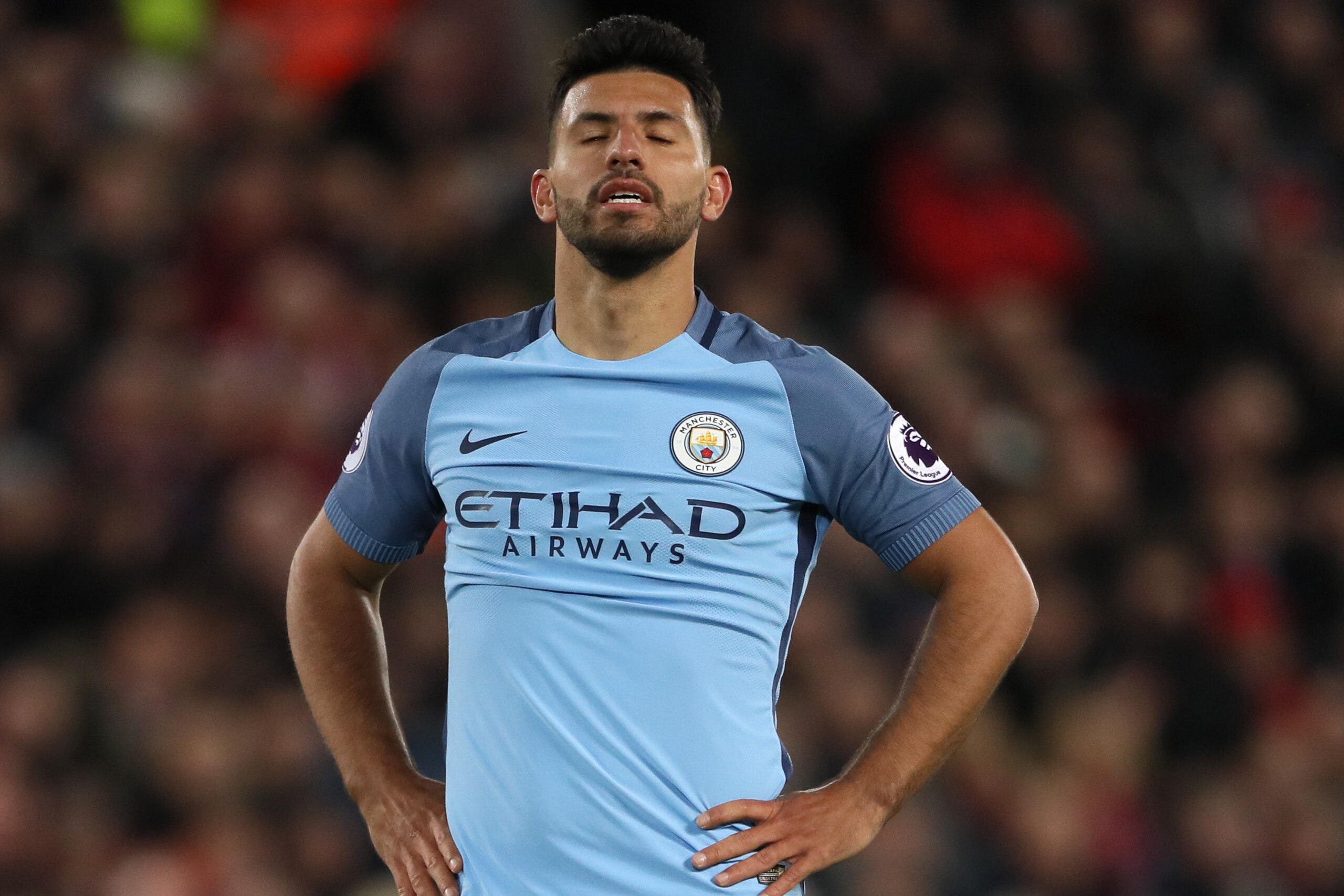 LIVERPOOL, ENGLAND - DECEMBER 31: A dejected Sergio Aguero of Manchester City during the Premier League match between Liverpool and Manchester City at Anfield on December 31, 2016 in Liverpool, England. (Photo by Matthew Ashton - AMA/Getty Images)