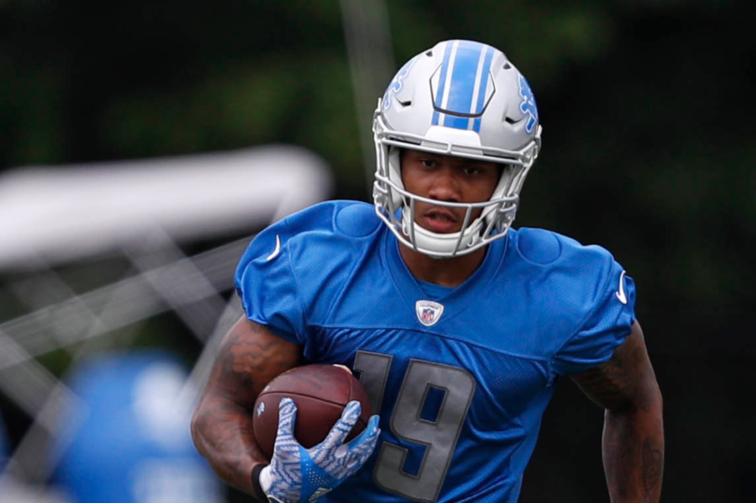 Jun 14, 2017; Allen Park, MI, USA; Detroit Lions wide receiver Kenny Golladay (19) runs after a catch during practice at Lions Headquarters and Training Facility. Mandatory Credit: Raj Mehta-USA TODAY Sports