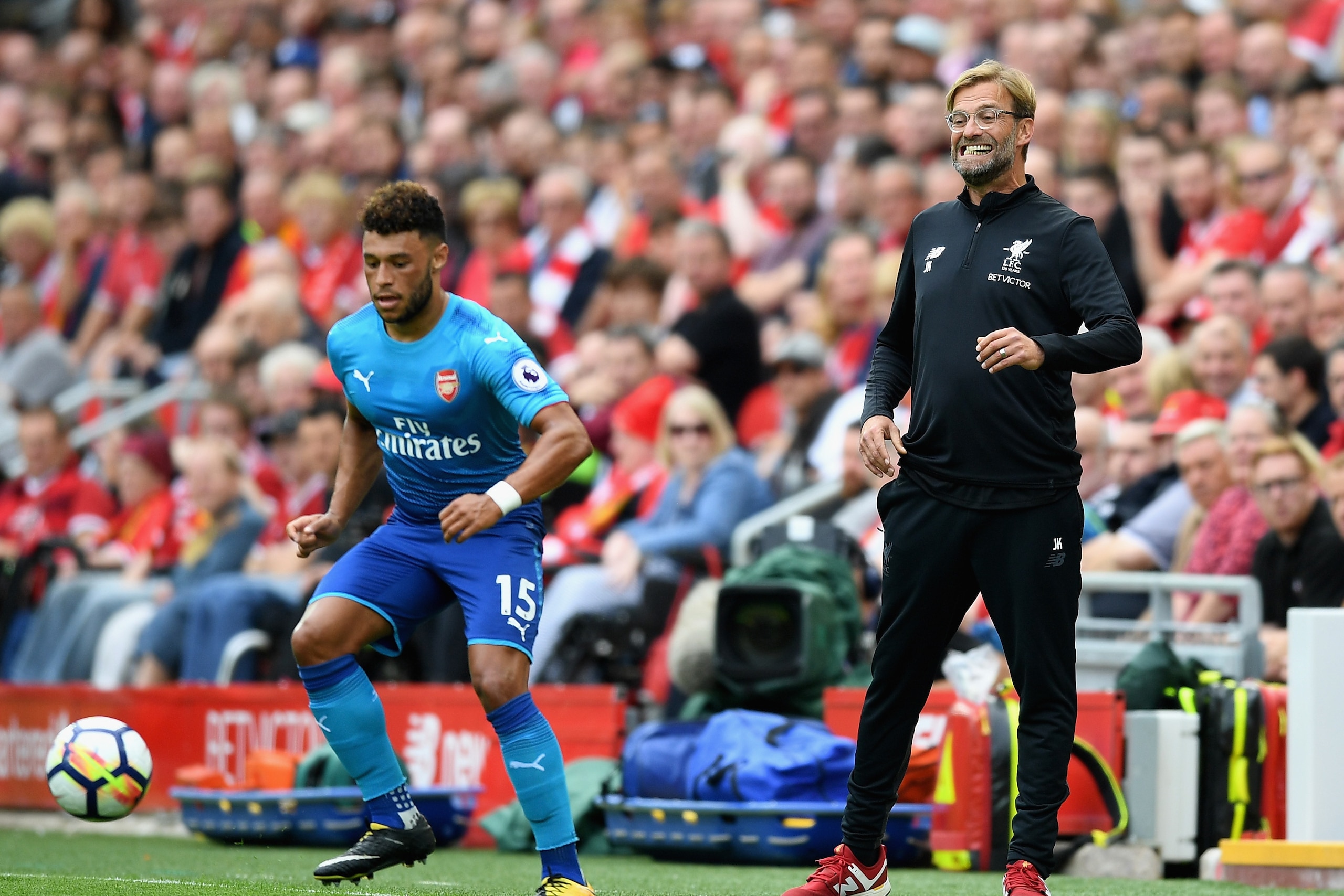 LIVERPOOL, ENGLAND - AUGUST 27: Jurgen Klopp, Manager of Liverpool reacts as Alex Oxlade-Chamberlain of Arsenal controls the ball during the Premier League match between Liverpool and Arsenal at Anfield on August 27, 2017 in Liverpool, England.  (Photo by