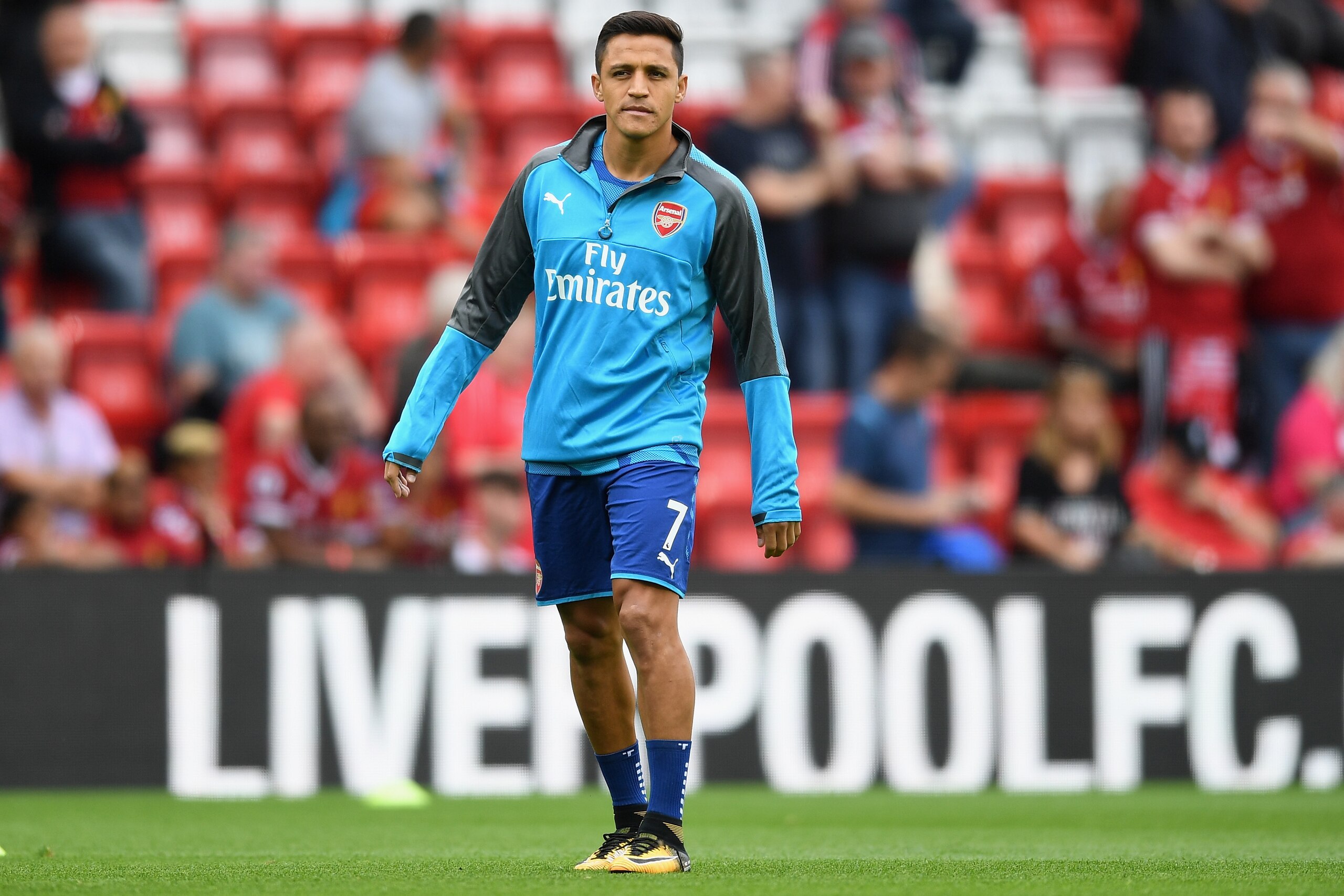 LIVERPOOL, ENGLAND - AUGUST 27:  Alexis Sanchez of Arsenal warms up prior to the Premier League match between Liverpool and Arsenal at Anfield on August 27, 2017 in Liverpool, England.  (Photo by Michael Regan/Getty Images)