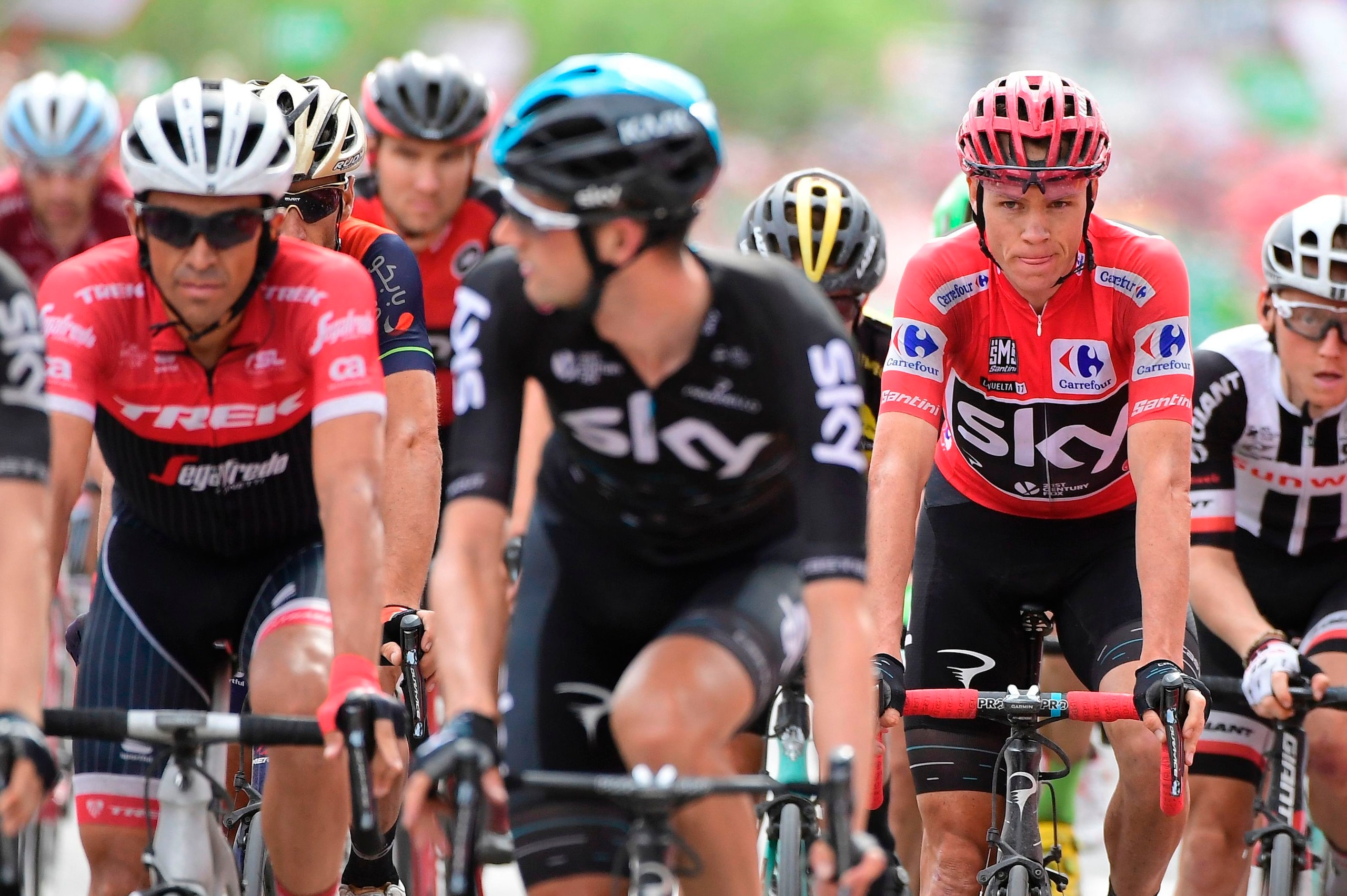 Trek Segafredo's Spanish Alberto Contador (L) and Sky's British Christopher Froome (R) cross the finish line of the 10th stage during the 72nd edition of 'La Vuelta' Tour of Spain cycling race, a 164,8 km route between Caravaca to Alhama de Murcia, on Aug Trek Segafredo's Spanish Alberto Contador (L) and Sky's British Christopher Froome (R) cross the finish line of the 10th stage during the 72nd edition of 'La Vuelta' Tour of Spain cycling race, a 164,8 km route between Caravaca to Alhama de Murcia, on Aug