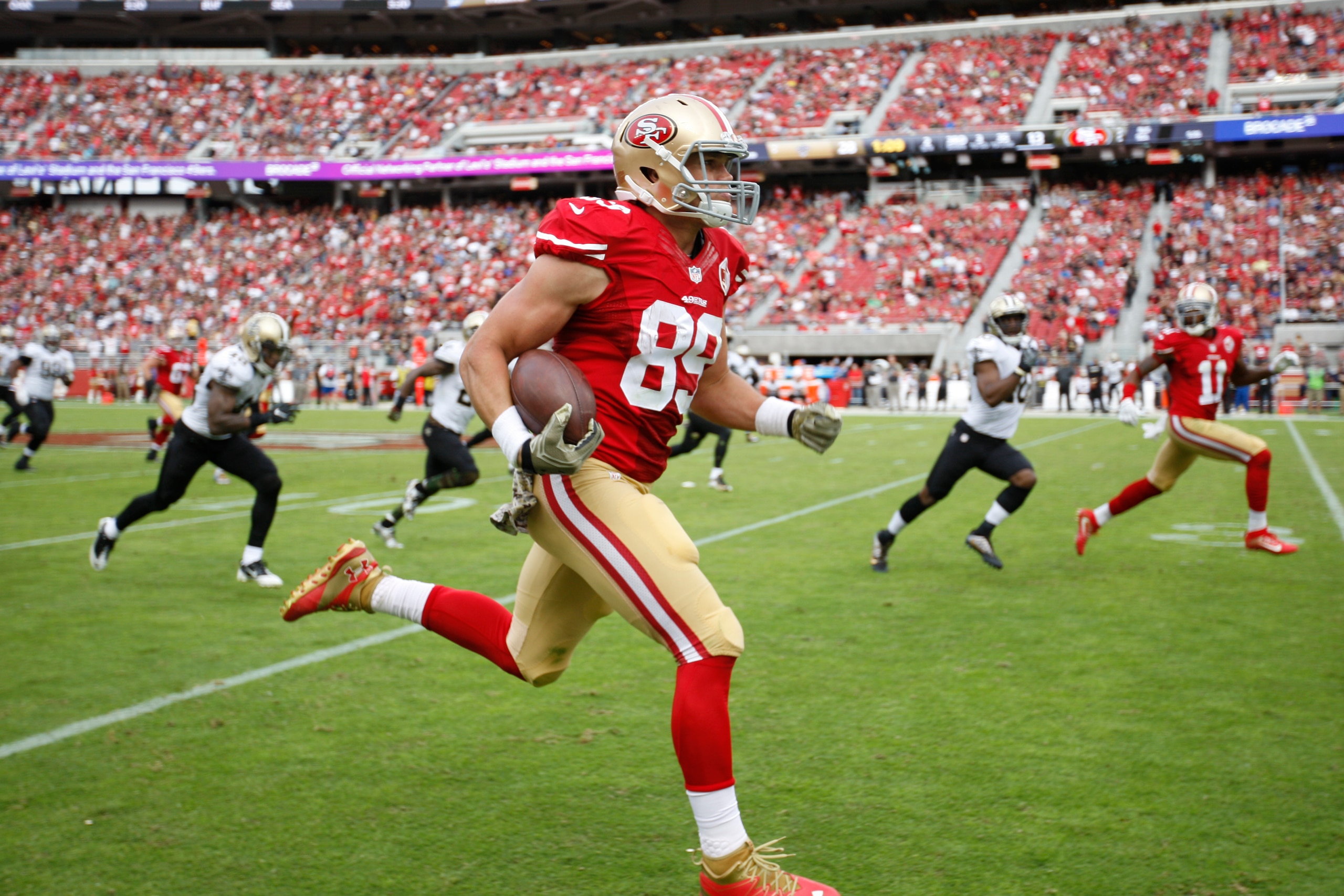 SANTA CLARA, CA - NOVEMBER 6: Vance McDonald #89 of the San Francisco 49ers heads to the end zone on a 65-yard touchdown reception during the game against the New Orleans Saints at Levi Stadium on November 6, 2016 in Santa Clara, California. The Saints de