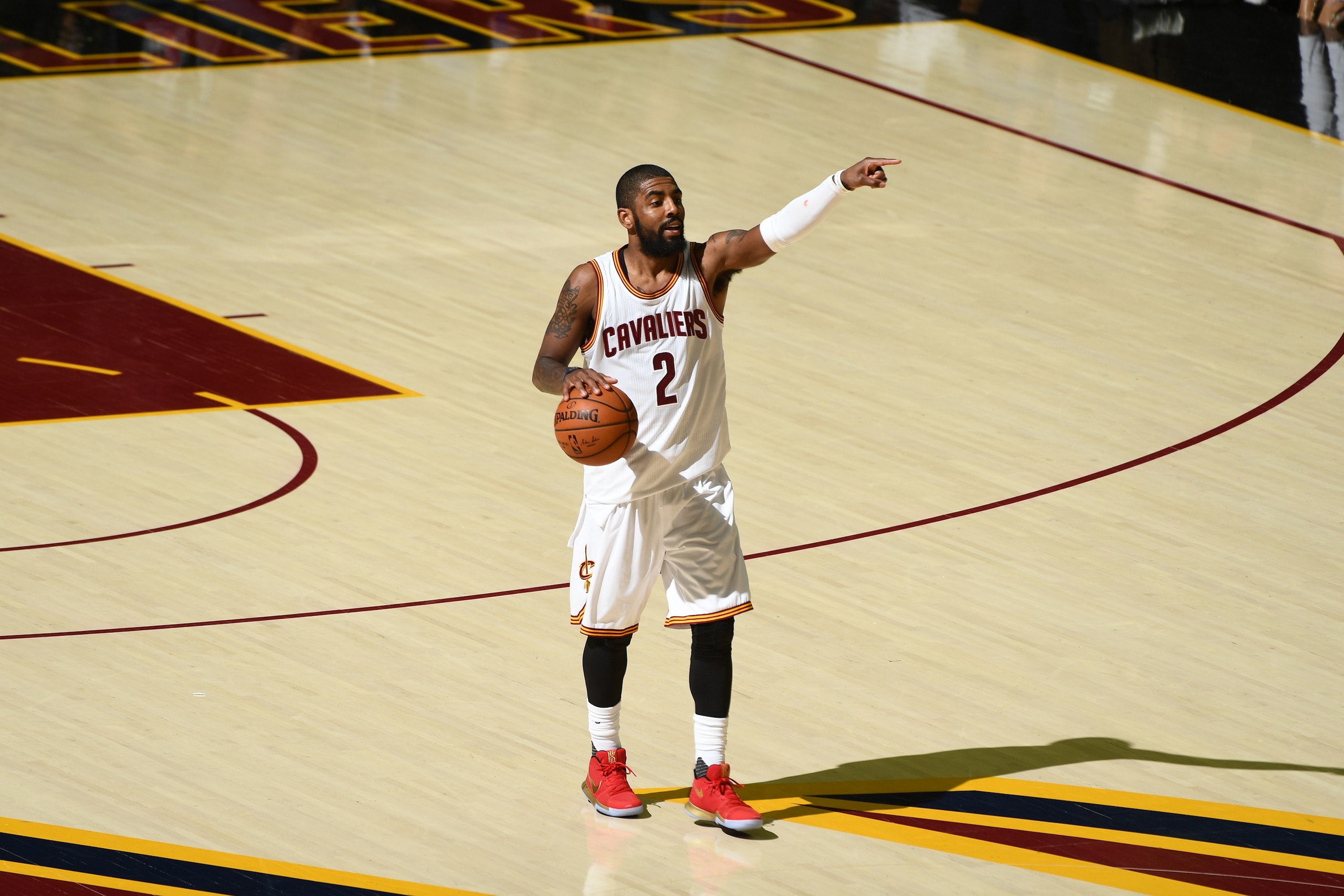 CLEVELAND, OH - JUNE 09: Kyrie Irving #2 of the Cleveland Cavaliers calls out a play against the Golden State Warriors in Game Four of the 2017 NBA Finals on June 9, 2017 at Quicken Loans Arena in Cleveland, Ohio. NOTE TO USER: User expressly acknowledge CLEVELAND, OH - JUNE 09: Kyrie Irving #2 of the Cleveland Cavaliers calls out a play against the Golden State Warriors in Game Four of the 2017 NBA Finals on June 9, 2017 at Quicken Loans Arena in Cleveland, Ohio. NOTE TO USER: User expressly acknowledge