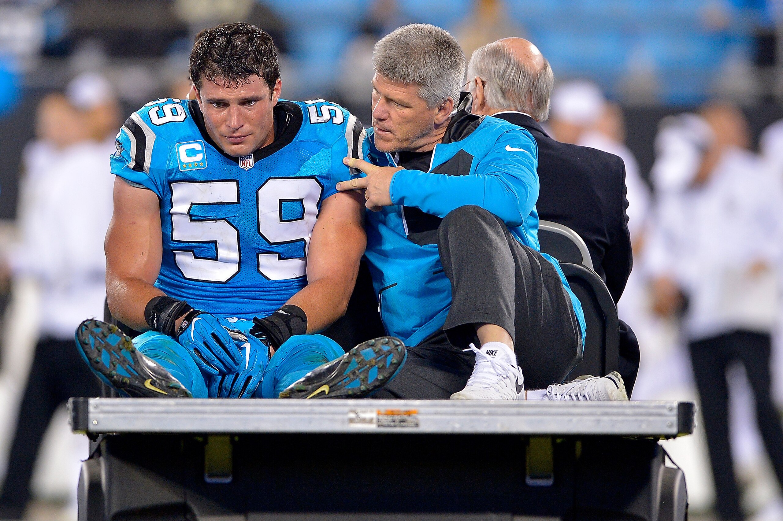 CHARLOTTE, NC - NOVEMBER 17:  Luke Kuechly #59 of the Carolina Panthers is carried off the field after an injury against the New Orleans Saints in the fourth quarter during the game at Bank of America Stadium on November 17, 2016 in Charlotte, North Carol