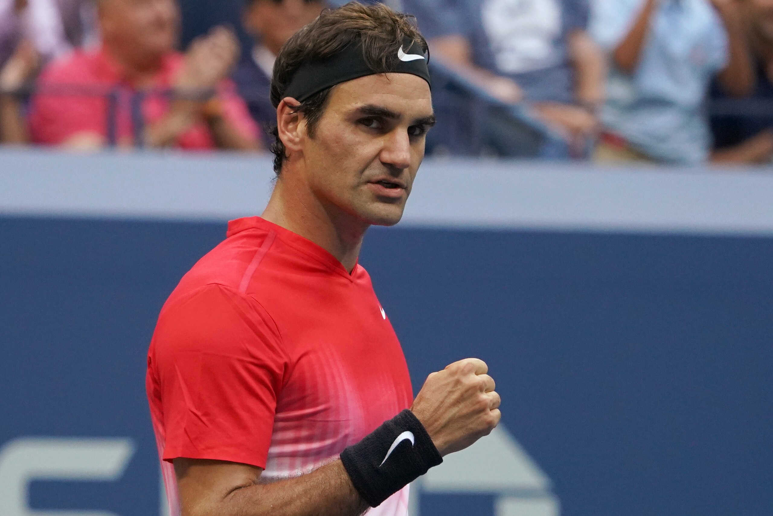 Roger Federer of Switzerland pumps his fist after making a shot agaist Mikhail Youzhny of Russia during their 2017 US Open Men's Singles match at the USTA Billie Jean King National Tennis Center in New York on August 31, 2017.  / AFP PHOTO / DON EMMERT   