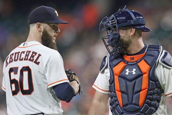Aug 24, 2017; Houston, TX, USA; Houston Astros catcher Brian McCann (16) visits starting pitcher Dallas Keuchel (60) on the mound against the Washington Nationals in the fifth inning at Minute Maid Park. Mandatory Credit: Thomas B. Shea-USA TODAY Sports