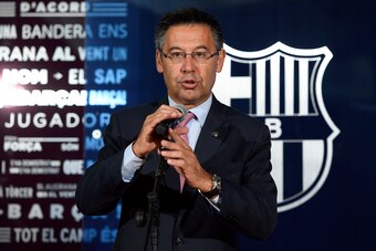Barcelona's president Josep Maria Bartomeu speaks during the official presentation of Barcelona's new Brazilian football player Paulinho Bezerra, after signing his new contract with the Catalan club at the Camp Nou stadium in Barcelona on August 17, 2017.