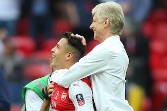 LONDON, ENGLAND - MAY 27: Arsene Wenger manager / head coach of Arsenal celebrates with Alexis Sanchez of Arsenal after the Emirates FA Cup Final match between Arsenal and Chelsea at Wembley Stadium on May 27, 2017 in London, England. (Photo by Catherine 