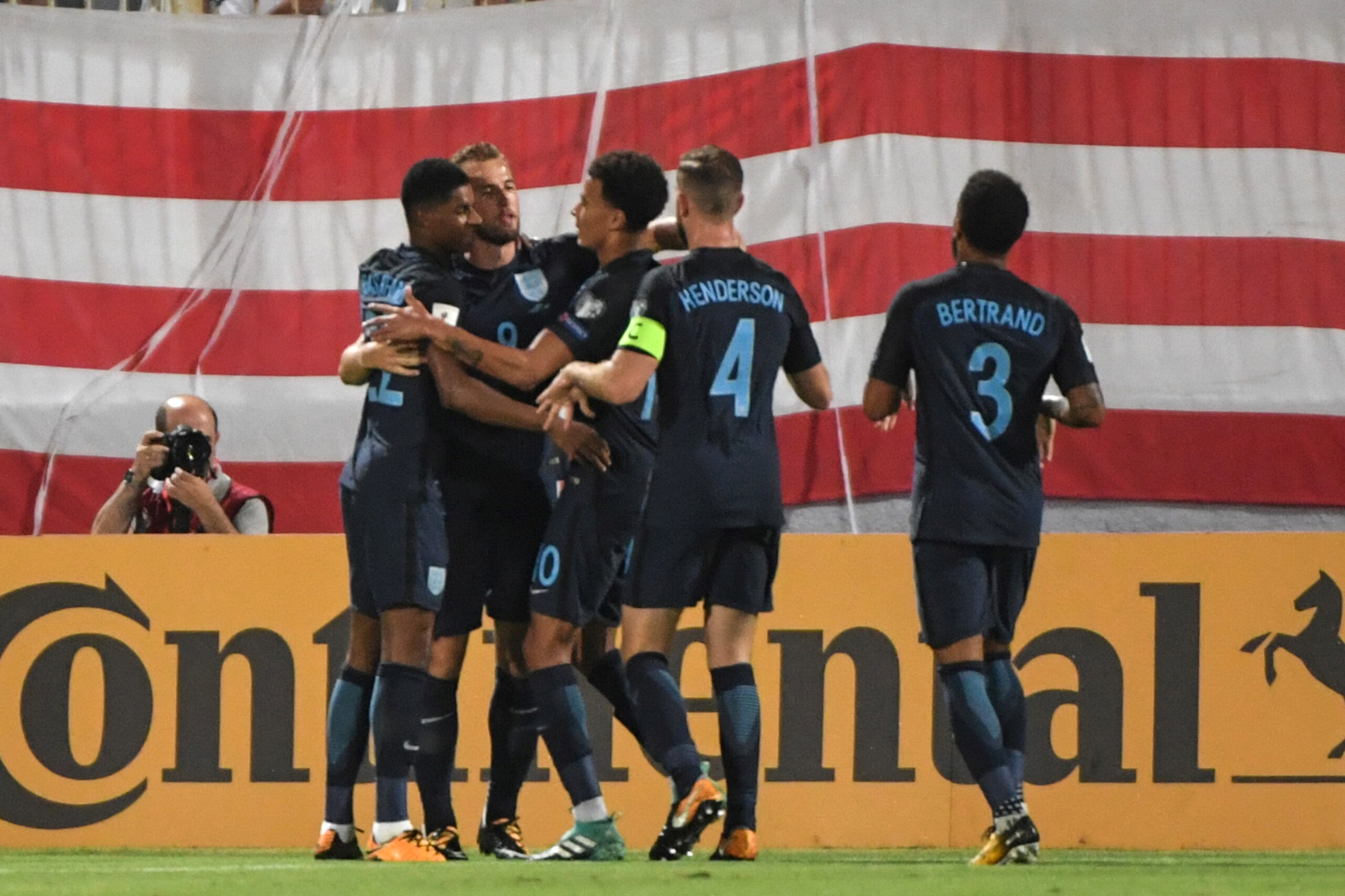England's striker Harry Kane (2nd L) celebrates with his teammates after scoring a goal during the 2018 FIFA World Cup group F qualifying football match between Malta and England at the National Stadium in TaQali, Malta, on September 1, 2017. / AFP PHOTO 
