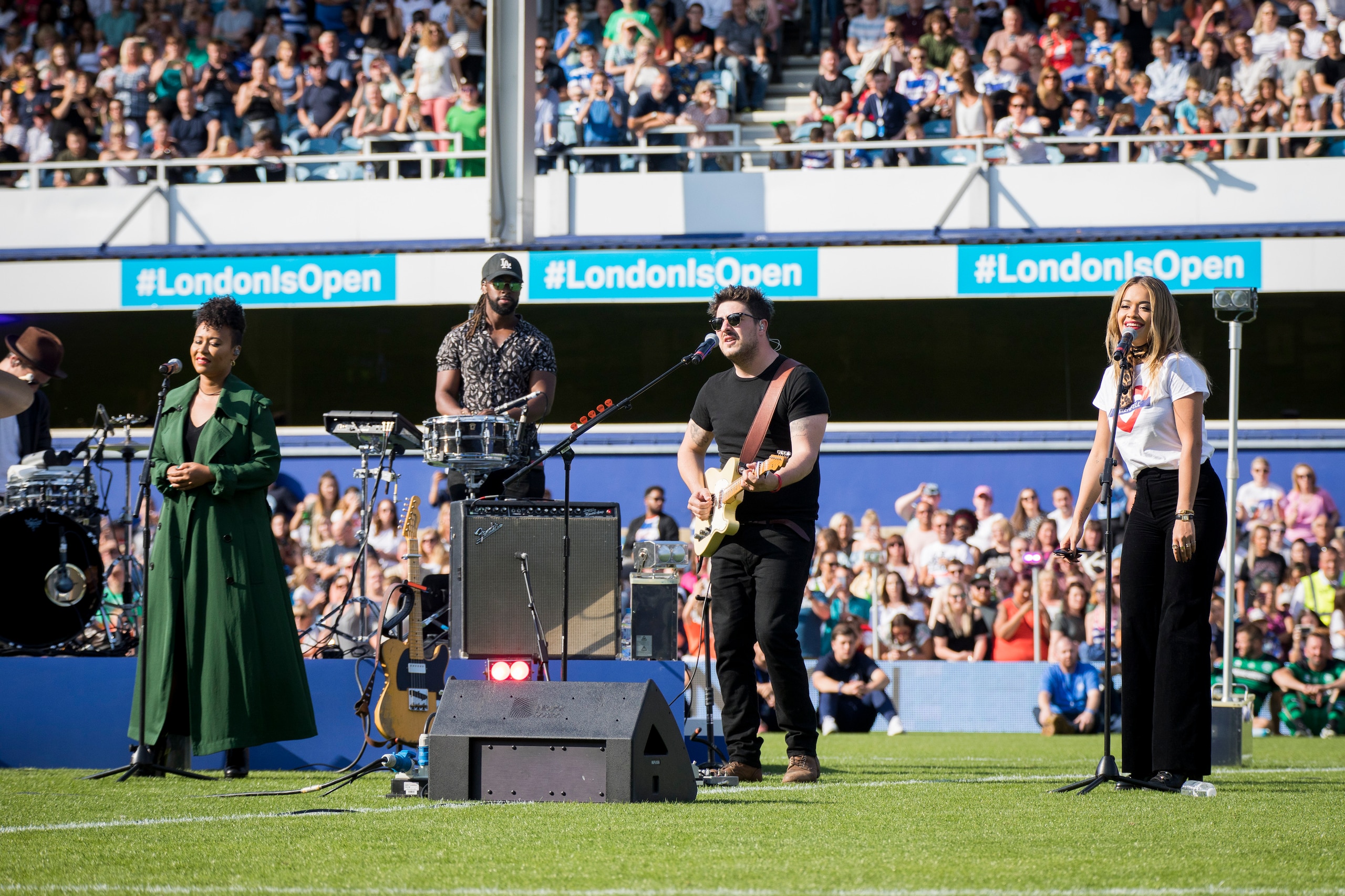 LONDON, ENGLAND - SEPTEMBER 02:  Emeli Sande, Marcus Mumford and Rita Ora perform live during the  #GAME4GRENFELL at Loftus Road on September 2, 2017 in London, England. The charity football match has been set up to benefit those who were affected in the 