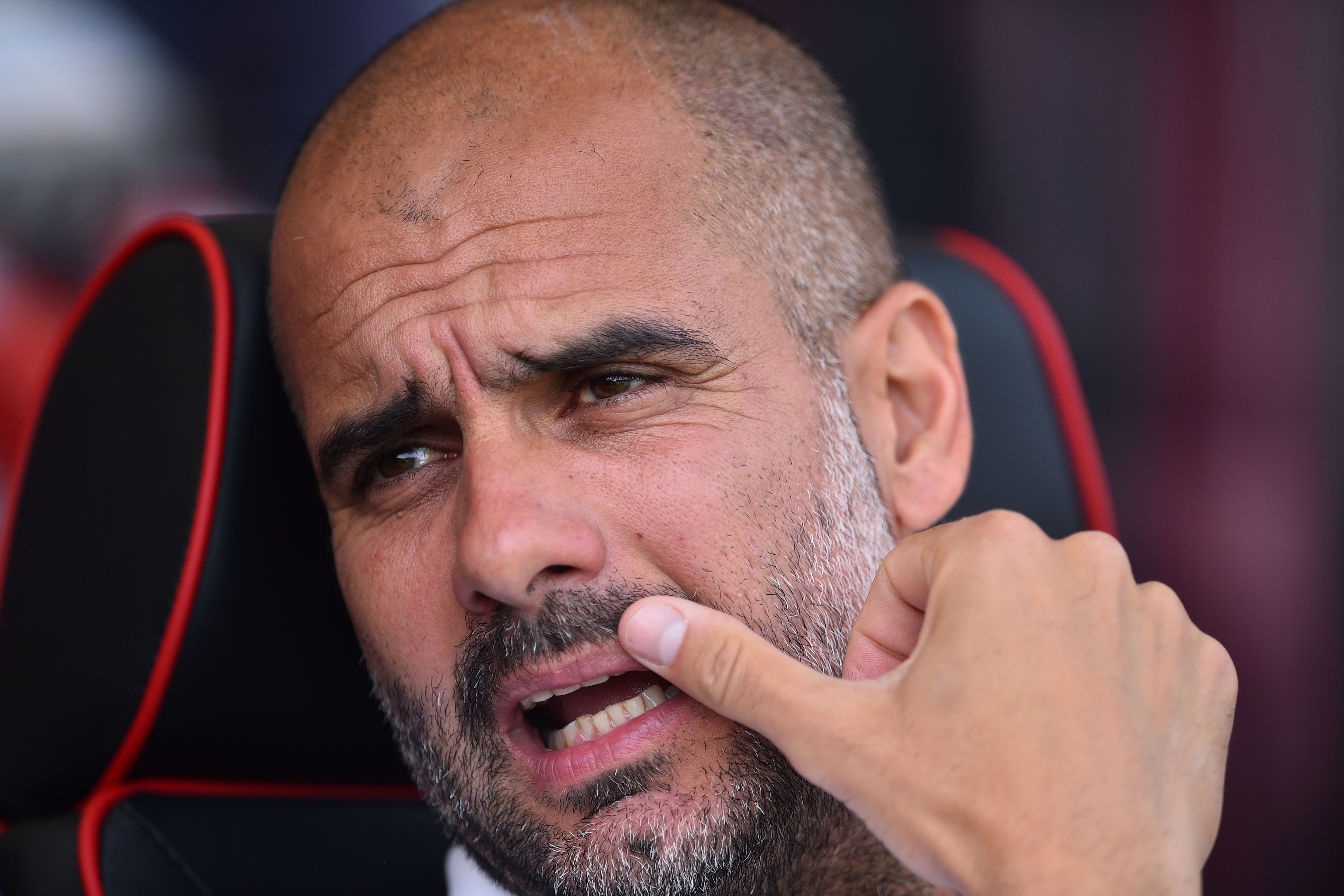Manchester City's Spanish manager Pep Guardiola gestures as he awaits kick off ahead of the English Premier League football match between Bournemouth and Manchester City at the Vitality Stadium in Bournemouth, southern England on August 26, 2017. / AFP PH Manchester City's Spanish manager Pep Guardiola gestures as he awaits kick off ahead of the English Premier League football match between Bournemouth and Manchester City at the Vitality Stadium in Bournemouth, southern England on August 26, 2017. / AFP PH