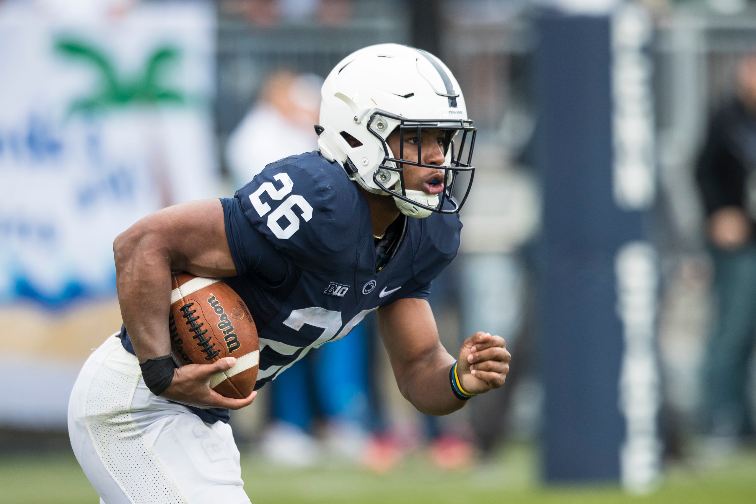 UNIVERSITY PARK, PA - SEPTEMBER 02:  Saquon Barkley #26 of the Penn State Nittany Lions returns a kickoff return during the second half against the Akron Zips on September 2, 2017 at Beaver Stadium in University Park, Pennsylvania. Penn State defeats Akro