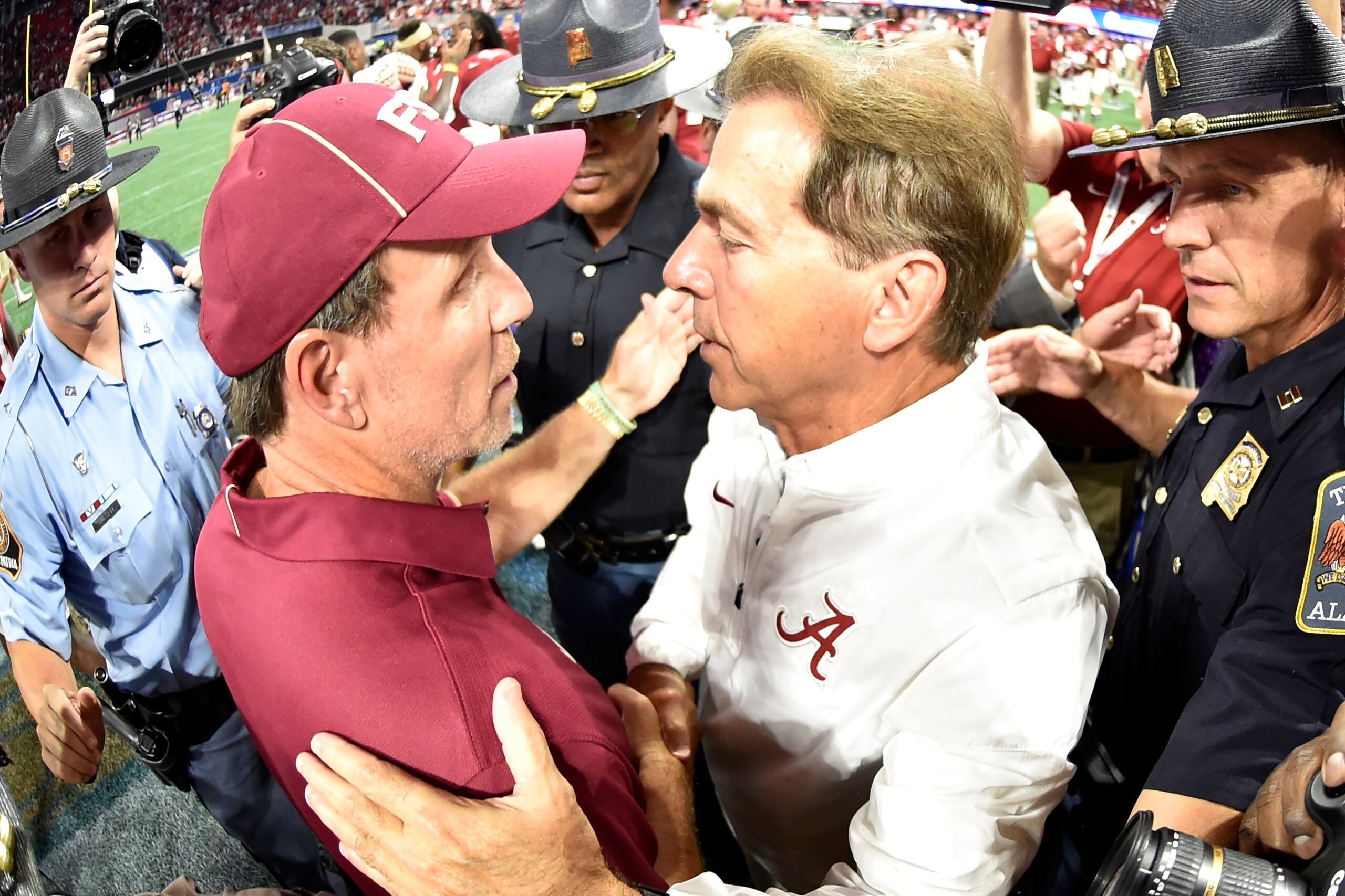 ATLANTA, GA - SEPTEMBER 02:  Head coach Nick Saban of the Alabama Crimson Tide speaks with head coach Jimbo Fisher of the Florida State Seminoles after their game at Mercedes-Benz Stadium on September 2, 2017 in Atlanta, Georgia.  (Photo by Scott Cunningh