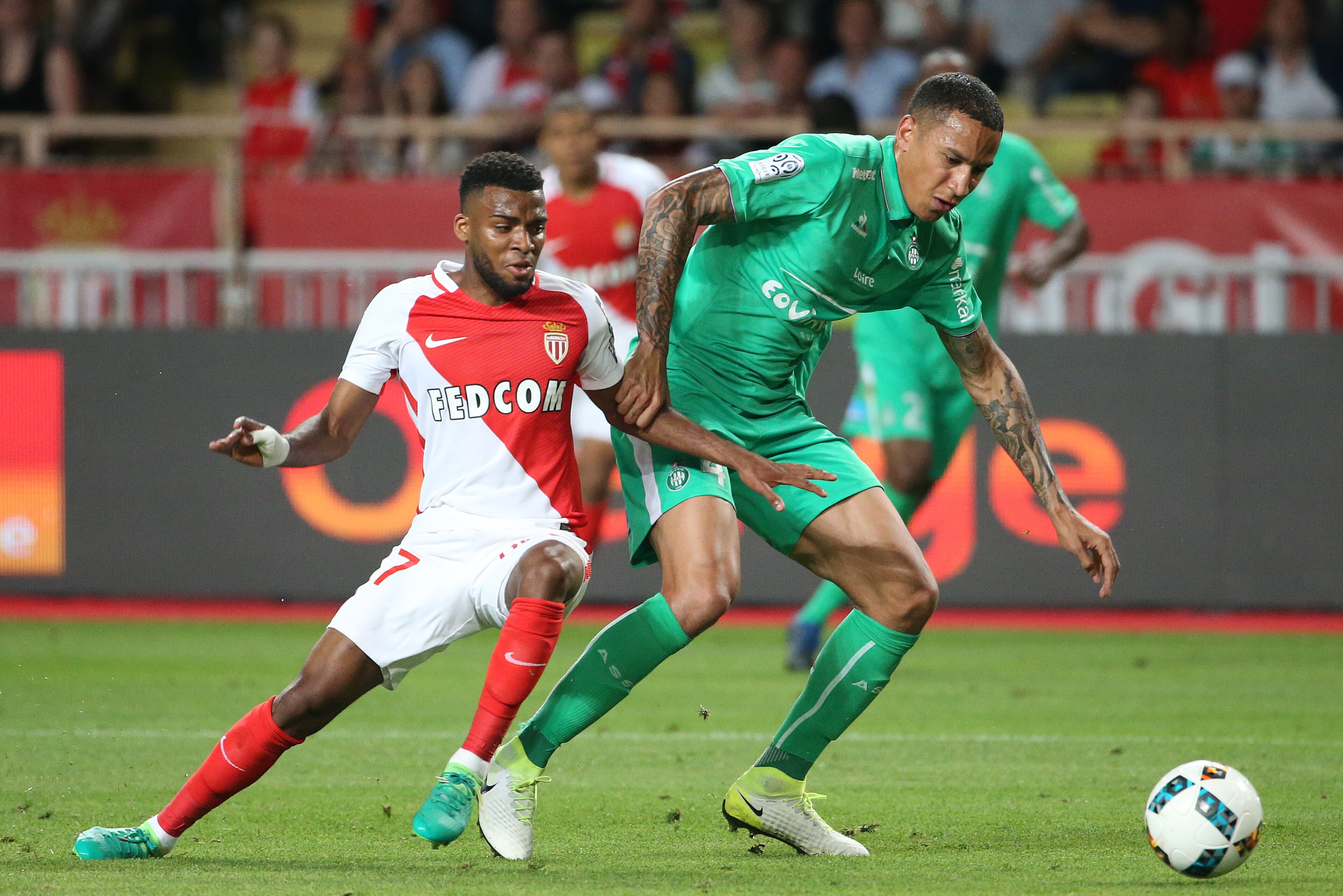 MONACO, MONACO - MAY 17: Thomas Lemar of Monaco and Leo Lacroix of Saint-Etienne in action during the French Ligue 1 match between AS Monaco and AS Saint-Etienne (ASSE) at Stade Louis II on May 17, 2017 in Monaco, Monaco. (Photo by Jean Catuffe/Getty Imag