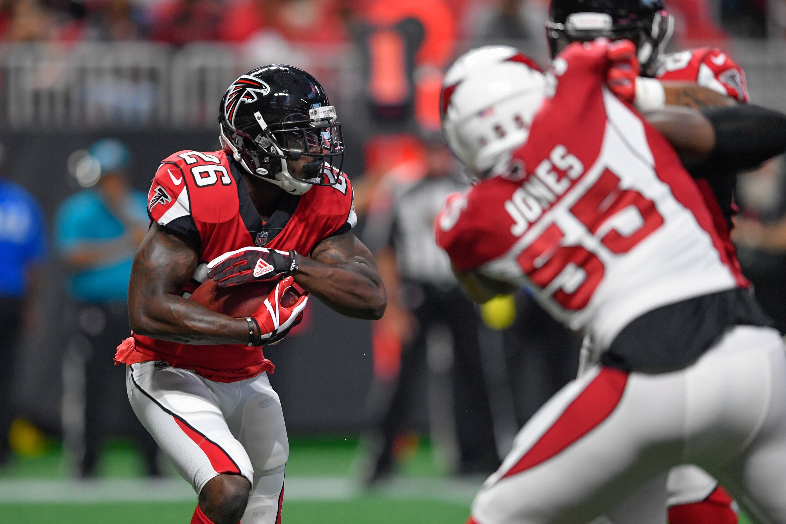 Aug 26, 2017; Atlanta, GA, USA; Atlanta Falcons running back Tevin Coleman (26) runs against the Arizona Cardinals during the first quarter at Mercedes-Benz Stadium. Mandatory Credit: Dale Zanine-USA TODAY Sports Aug 26, 2017; Atlanta, GA, USA; Atlanta Falcons running back Tevin Coleman (26) runs against the Arizona Cardinals during the first quarter at Mercedes-Benz Stadium. Mandatory Credit: Dale Zanine-USA TODAY Sports