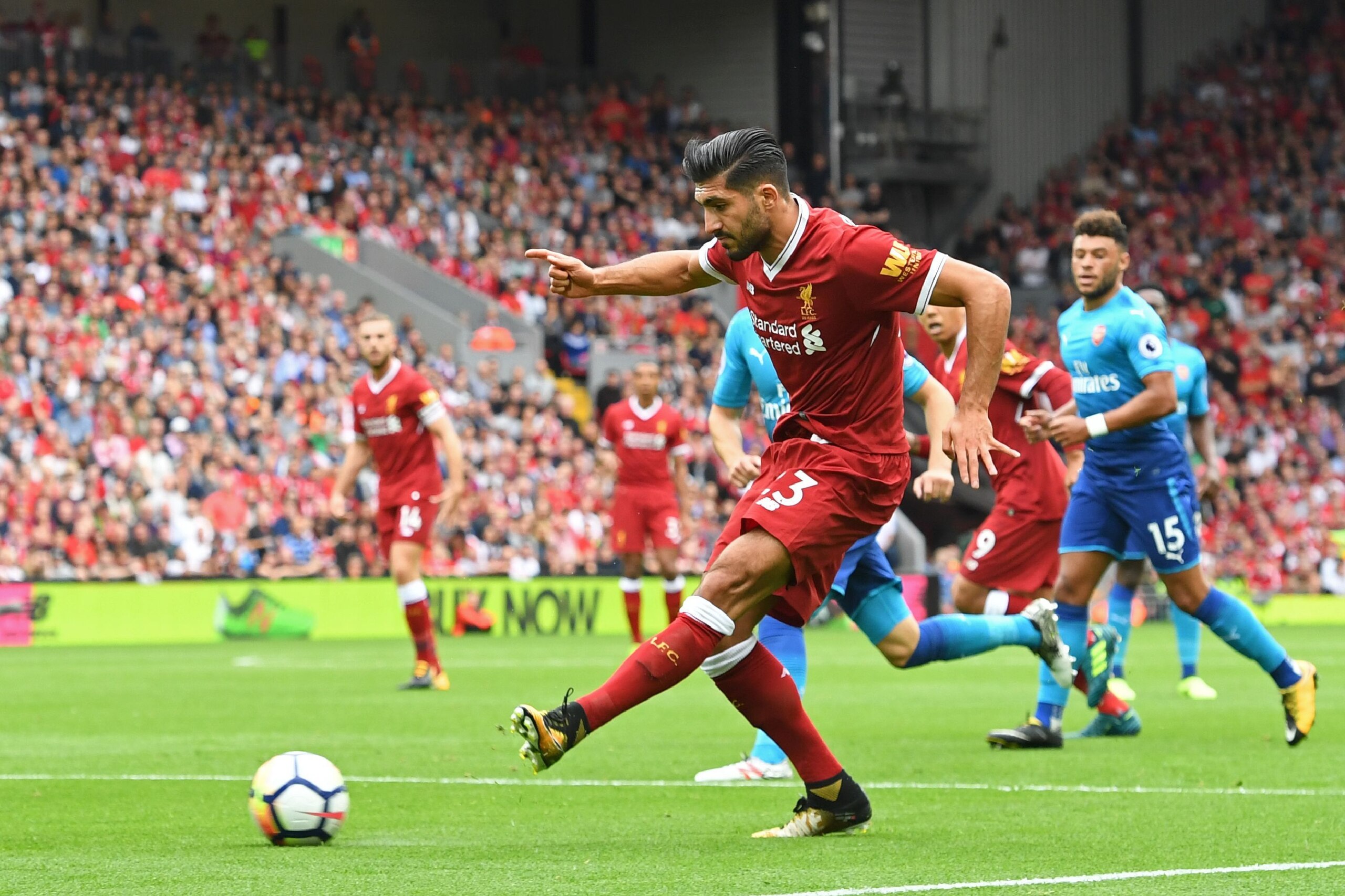 Liverpool's German midfielder Emre Can passes the ball during the English Premier League football match between Liverpool and Arsenal at Anfield in Liverpool, north west England on August 27, 2017. / AFP PHOTO / Anthony Devlin / RESTRICTED TO EDITORIAL US