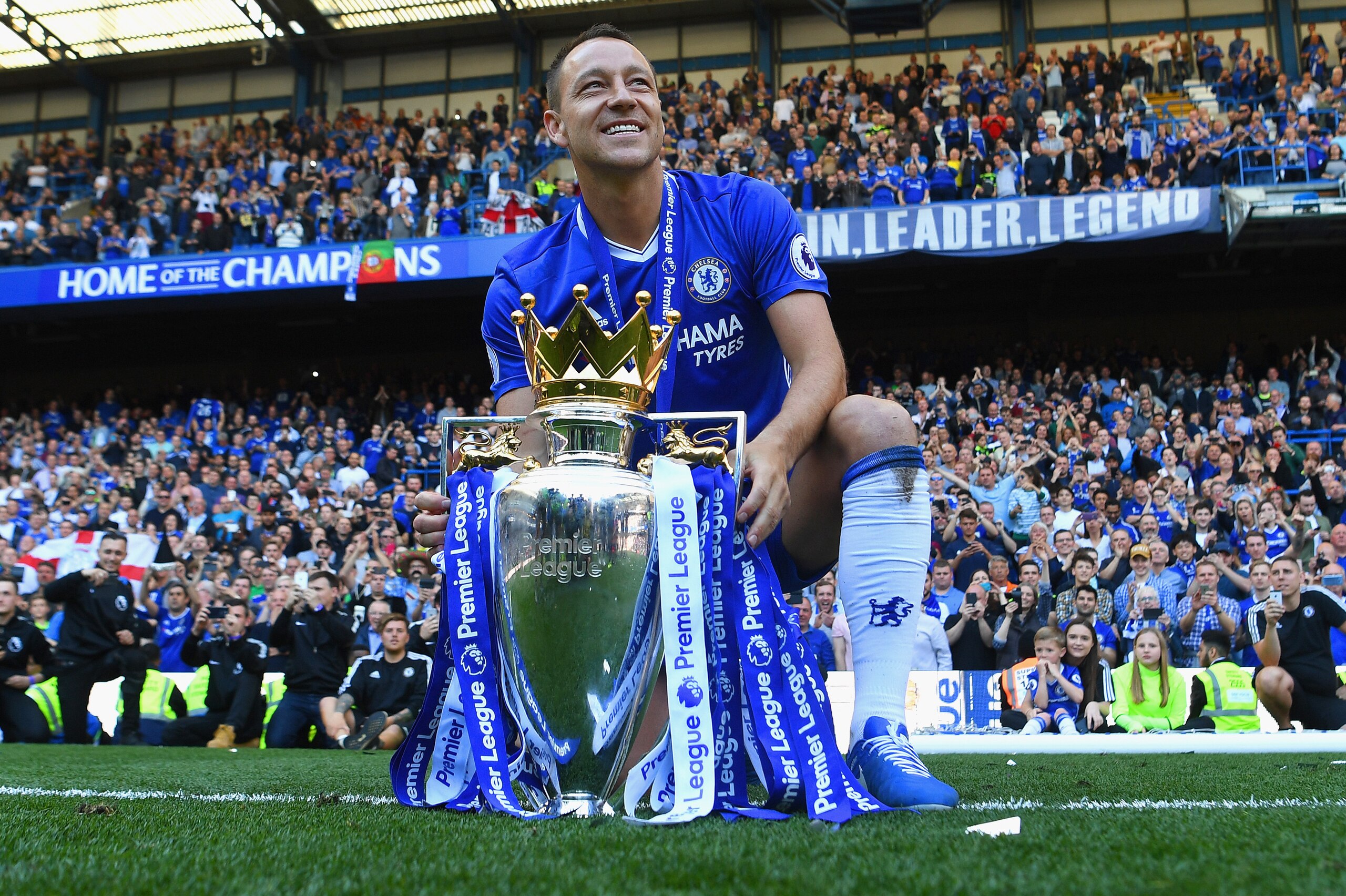 LONDON, ENGLAND - MAY 21:  John Terry of Chelsea poses with the Premier League Trophy after the Premier League match between Chelsea and Sunderland at Stamford Bridge on May 21, 2017 in London, England.  (Photo by Michael Regan/Getty Images)