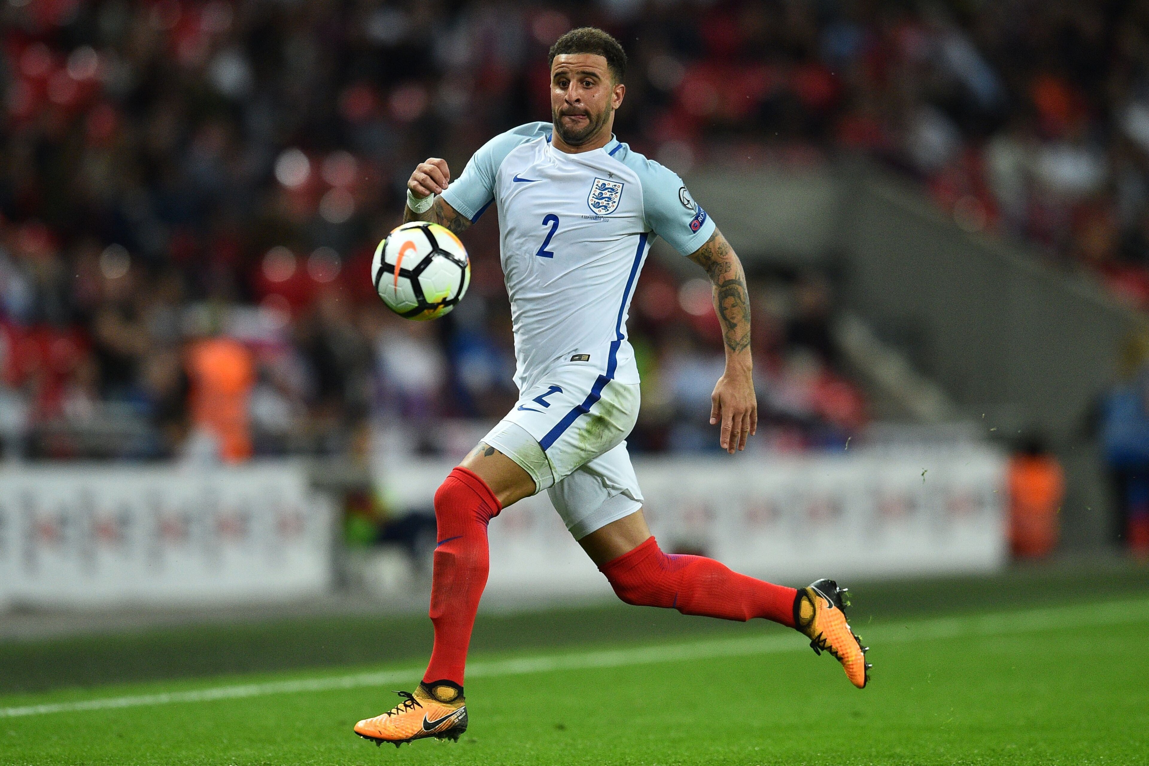England's defender Kyle Walker runs with the ball during the World Cup 2018 qualification football match between England and Slovakia at Wembley Stadium in London on September 4, 2017.  / AFP PHOTO / Glyn KIRK / NOT FOR MARKETING OR ADVERTISING USE / REST