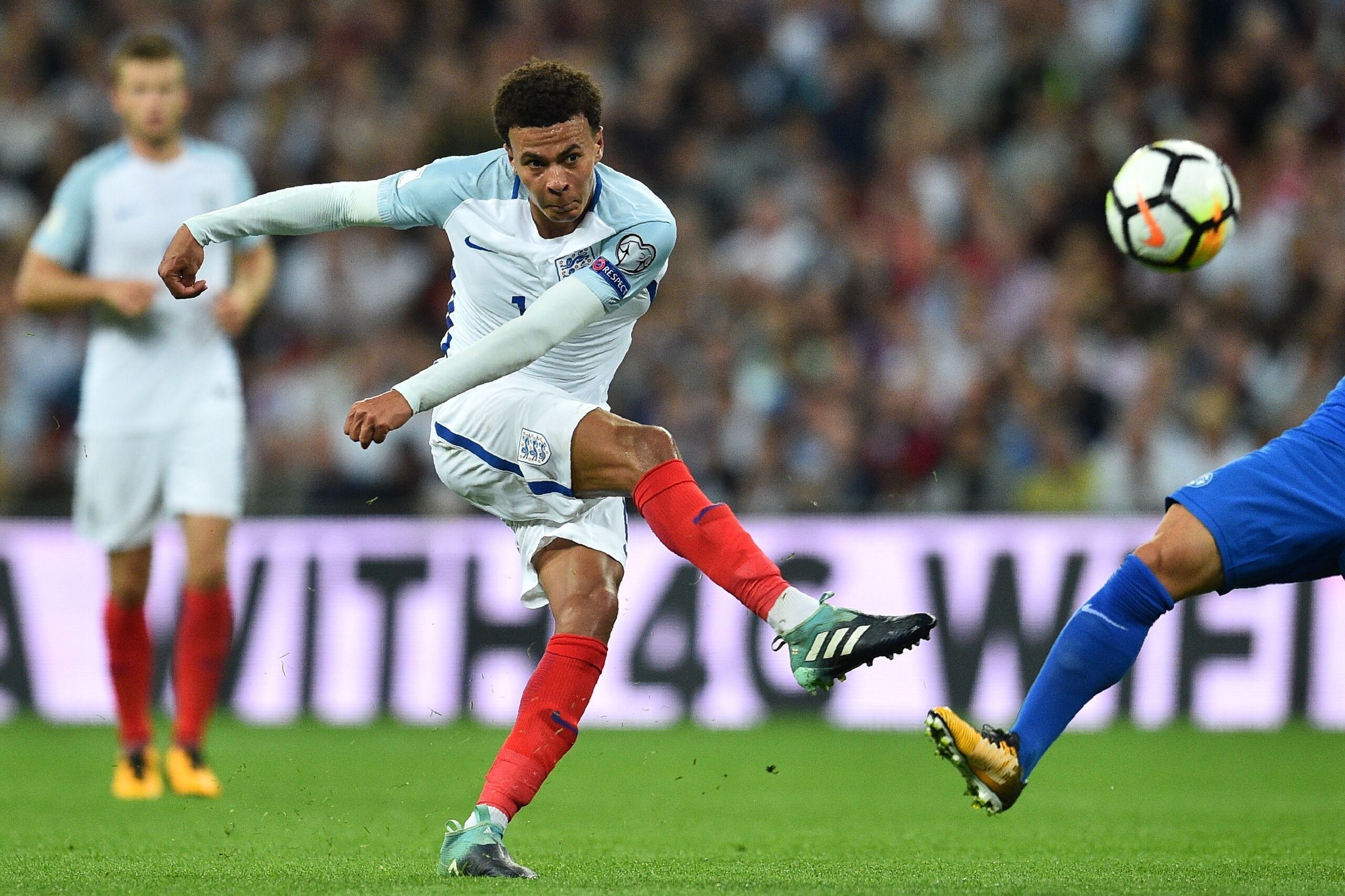 England's midfielder Dele Alli has an unsuccessful shot during the World Cup 2018 qualification football match between England and Slovakia at Wembley Stadium in London on September 4, 2017. / AFP PHOTO / Glyn KIRK / NOT FOR MARKETING OR ADVERTISING USE England's midfielder Dele Alli has an unsuccessful shot during the World Cup 2018 qualification football match between England and Slovakia at Wembley Stadium in London on September 4, 2017. / AFP PHOTO / Glyn KIRK / NOT FOR MARKETING OR ADVERTISING USE