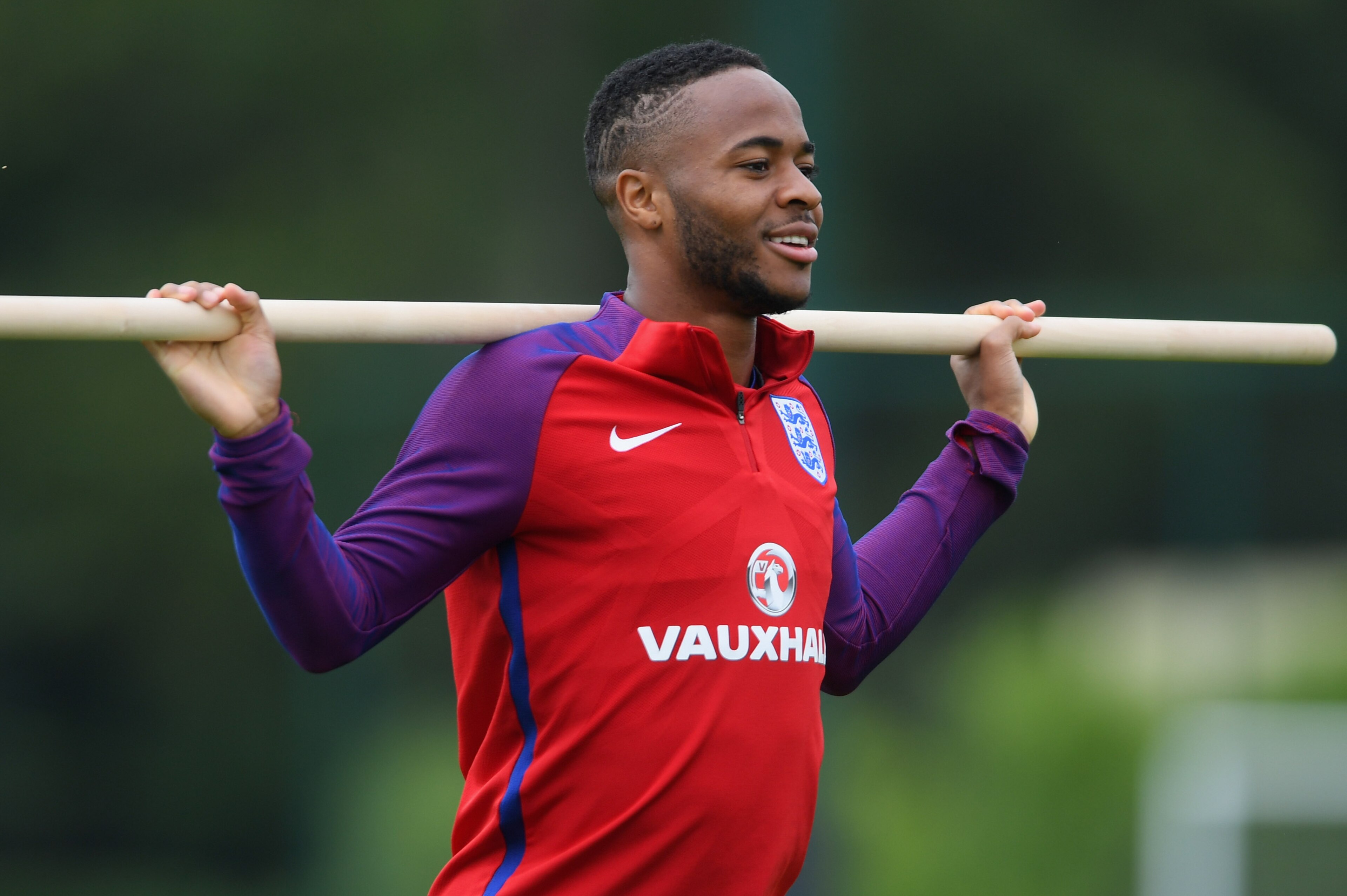 ENFIELD, ENGLAND - SEPTEMBER 03:  Raheem Sterling of England walks onto the pitch during an England training session on the eve of their World Cup qualifier against Slovakia at Tottenham Hotspur FC Training Ground on September 3, 2017 in Enfield, England.