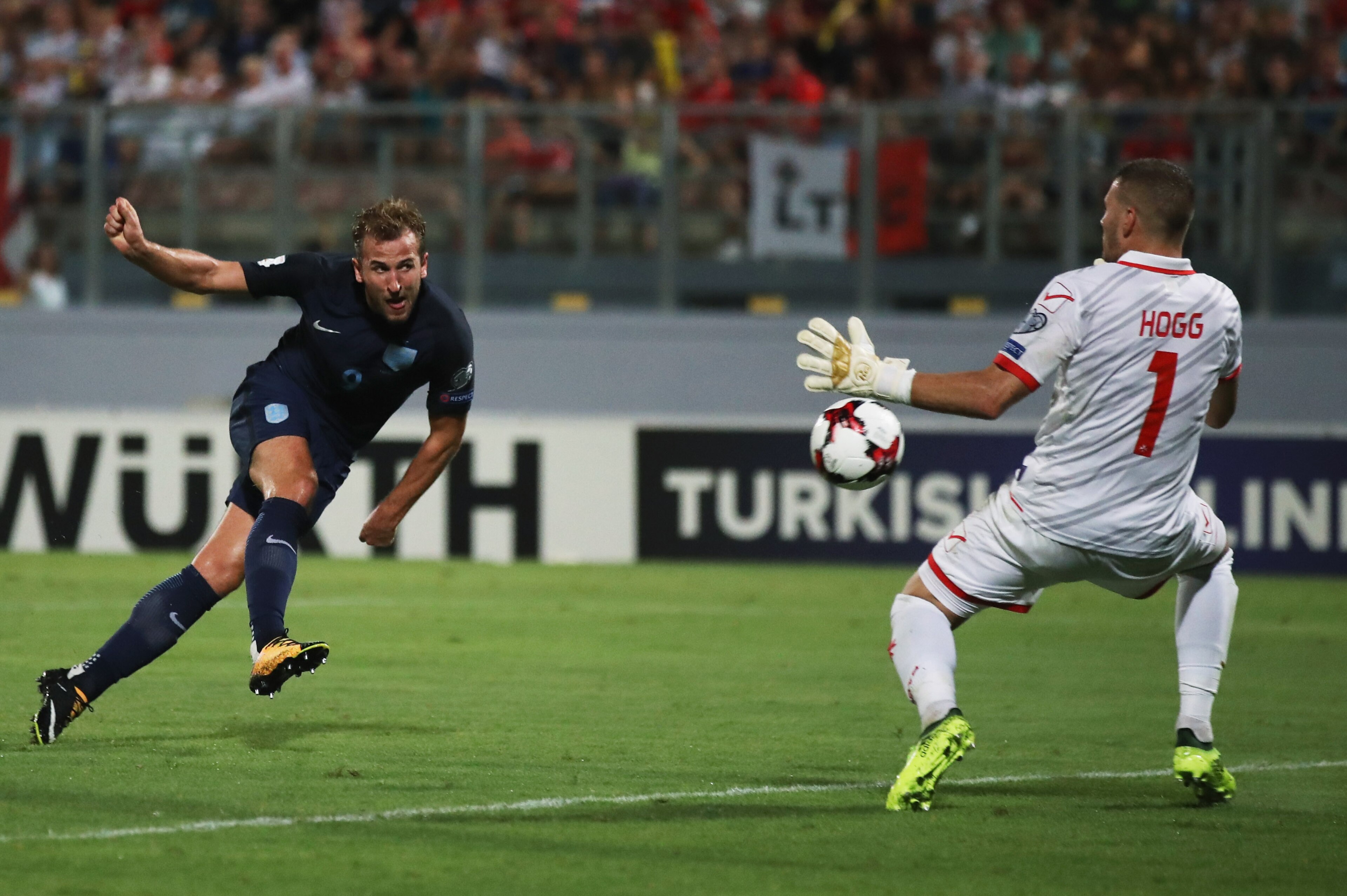 VALLETTA, MALTA - SEPTEMBER 01:  Harry Kane of England scores their fourth goal past Andrew Hogg of Malta during the FIFA 2018 World Cup Qualifier between Malta and England at Ta'Qali National Stadium on September 1, 2017 in Valletta, Malta.  (Photo by Ju