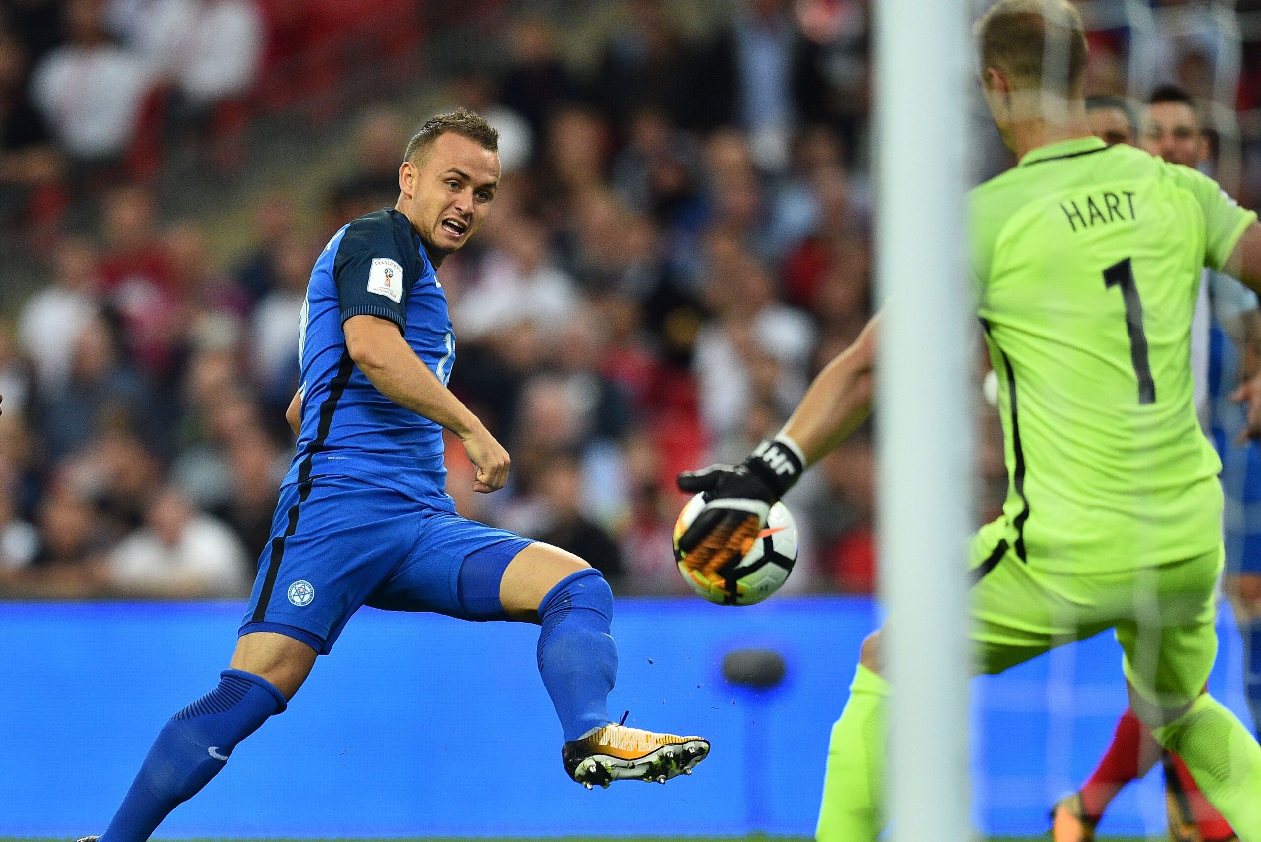 Slovakia's midfielder Stanislav Lobotka shoots past England's goalkeeper Joe Hart (R) to score the opening goal of the World Cup 2018 qualification football match between England and Slovakia at Wembley Stadium in London on September 4, 2017. / AFP PHOTO Slovakia's midfielder Stanislav Lobotka shoots past England's goalkeeper Joe Hart (R) to score the opening goal of the World Cup 2018 qualification football match between England and Slovakia at Wembley Stadium in London on September 4, 2017. / AFP PHOTO