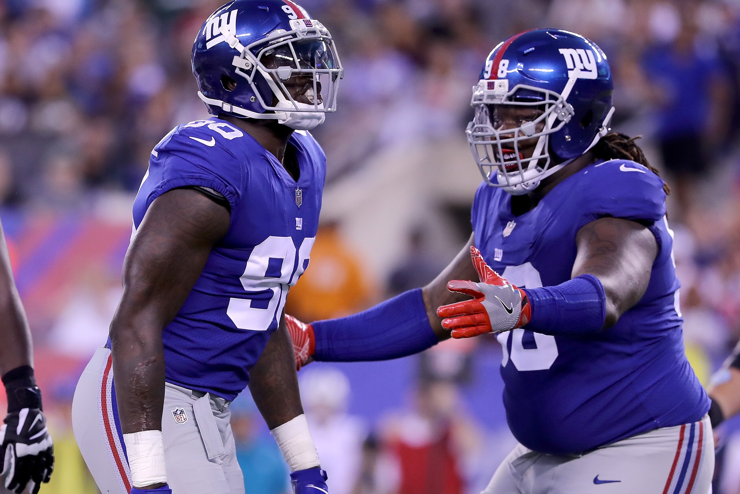 EAST RUTHERFORD, NJ - AUGUST 26: Jason Pierre-Paul #90 of the New York Giants is congratulated by teammate Damon Harrison #98 after he sacked quarterback Christian Hackenberg of the New York Jets in the first quarter during a preseason game on August 26 EAST RUTHERFORD, NJ - AUGUST 26: Jason Pierre-Paul #90 of the New York Giants is congratulated by teammate Damon Harrison #98 after he sacked quarterback Christian Hackenberg of the New York Jets in the first quarter during a preseason game on August 26