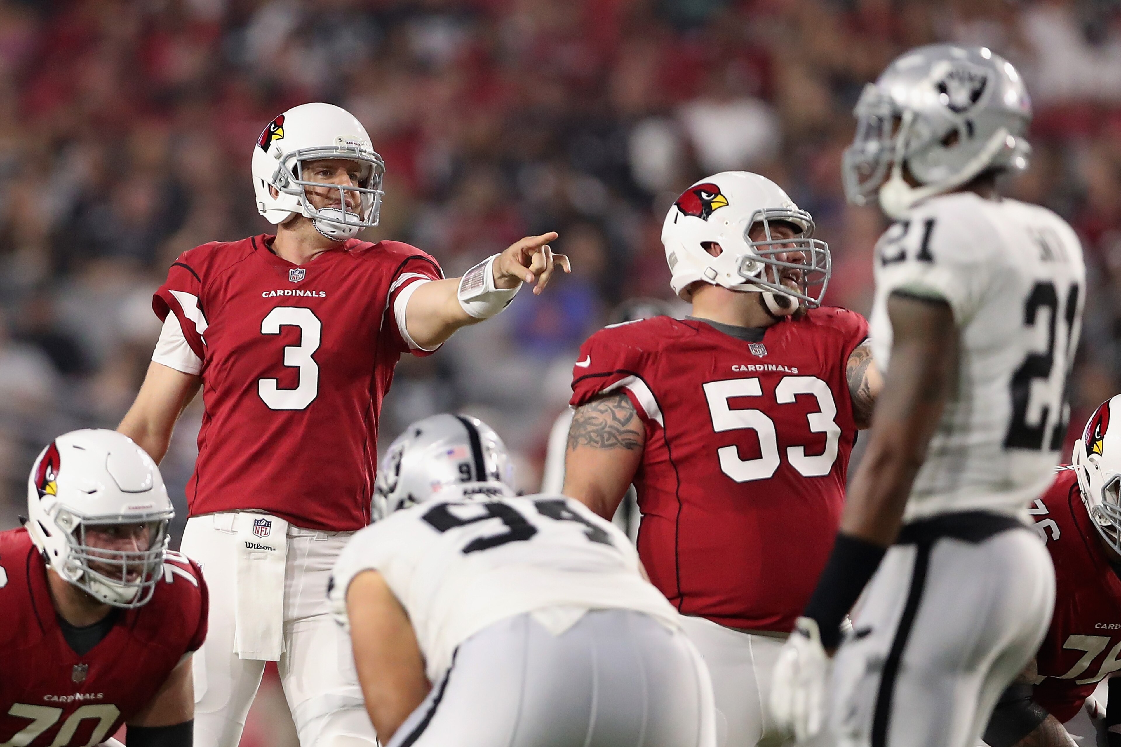 GLENDALE, AZ - AUGUST 12:  Quarterback Carson Palmer #3 of the Arizona Cardinals prepares to snap the football during the NFL game against the Oakland Raiders at the University of Phoenix Stadium on August 12, 2017 in Glendale, Arizona.  The Cardinals def