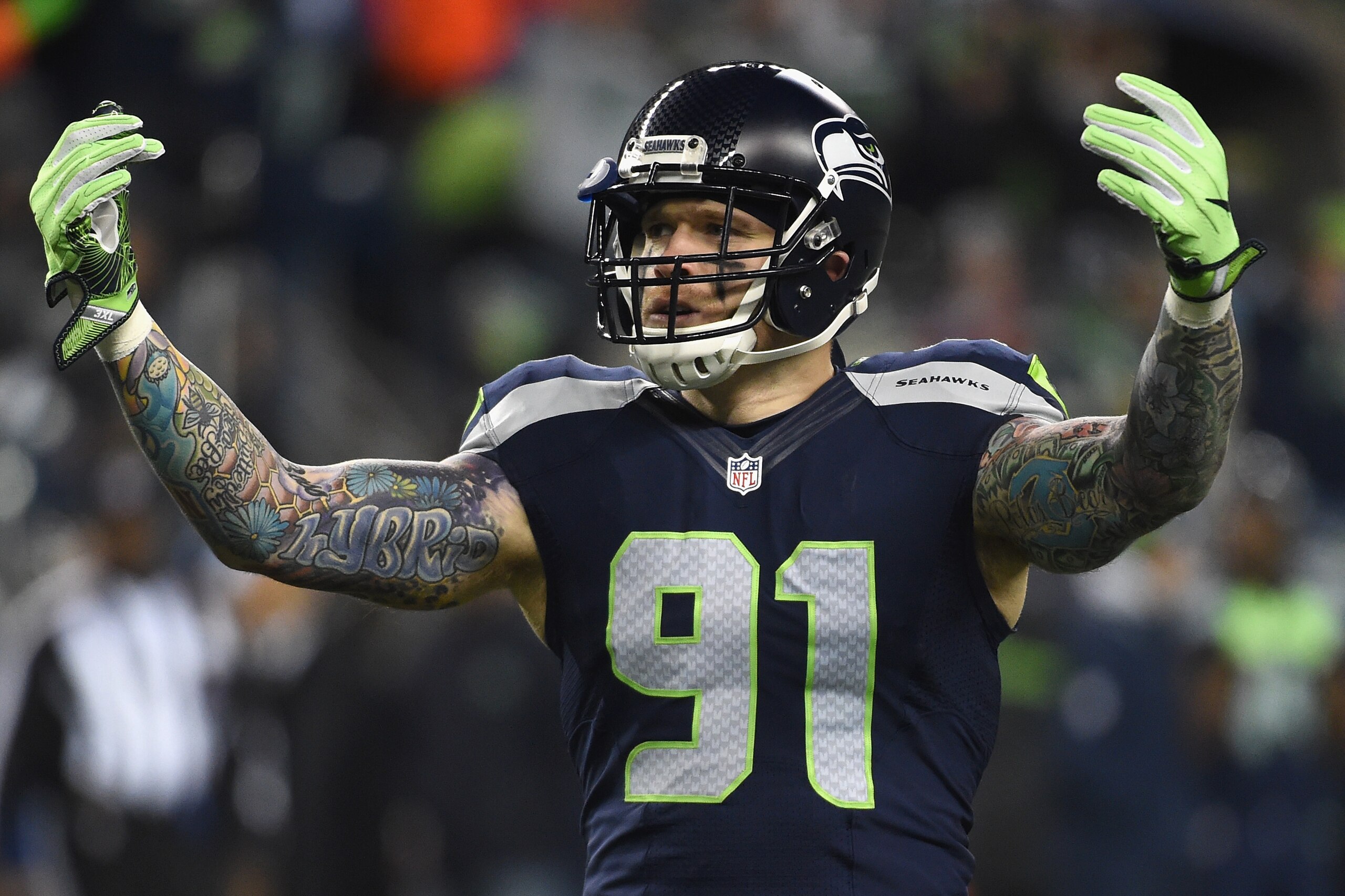 SEATTLE, WA - JANUARY 07:  Cassius Marsh #91 of the Seattle Seahawks reacts during the first half against the Detroit Lions in the NFC Wild Card game at CenturyLink Field on January 7, 2017 in Seattle, Washington.  (Photo by Steve Dykes/Getty Images)