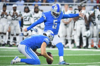 Aug 19, 2017; Detroit, MI, USA; Detroit Lions kicker Matt Prater (5) kicks a field goal as punter Kasey Redfern (2) holds the ball during the fourth quarter against the New York Jets at Ford Field. Mandatory Credit: Tim Fuller-USA TODAY Sports