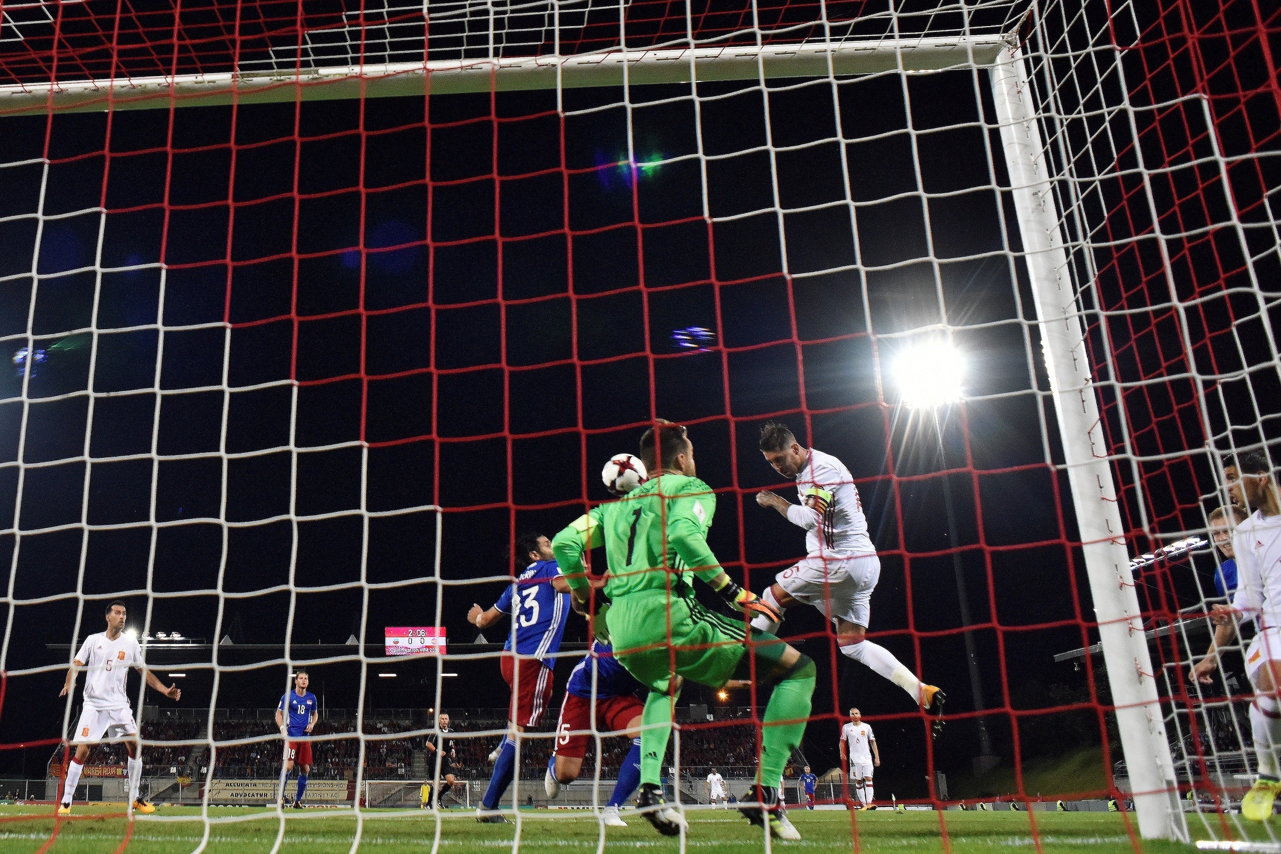Spain's Sergio Ramos (C) scores a goal during the FIFA World Cup 2018 qualification football match between Liechtenstein and Spain on September 5, 2017 in Vaduz. / AFP PHOTO / Michael Buholzer        (Photo credit should read MICHAEL BUHOLZER/AFP/Getty Im