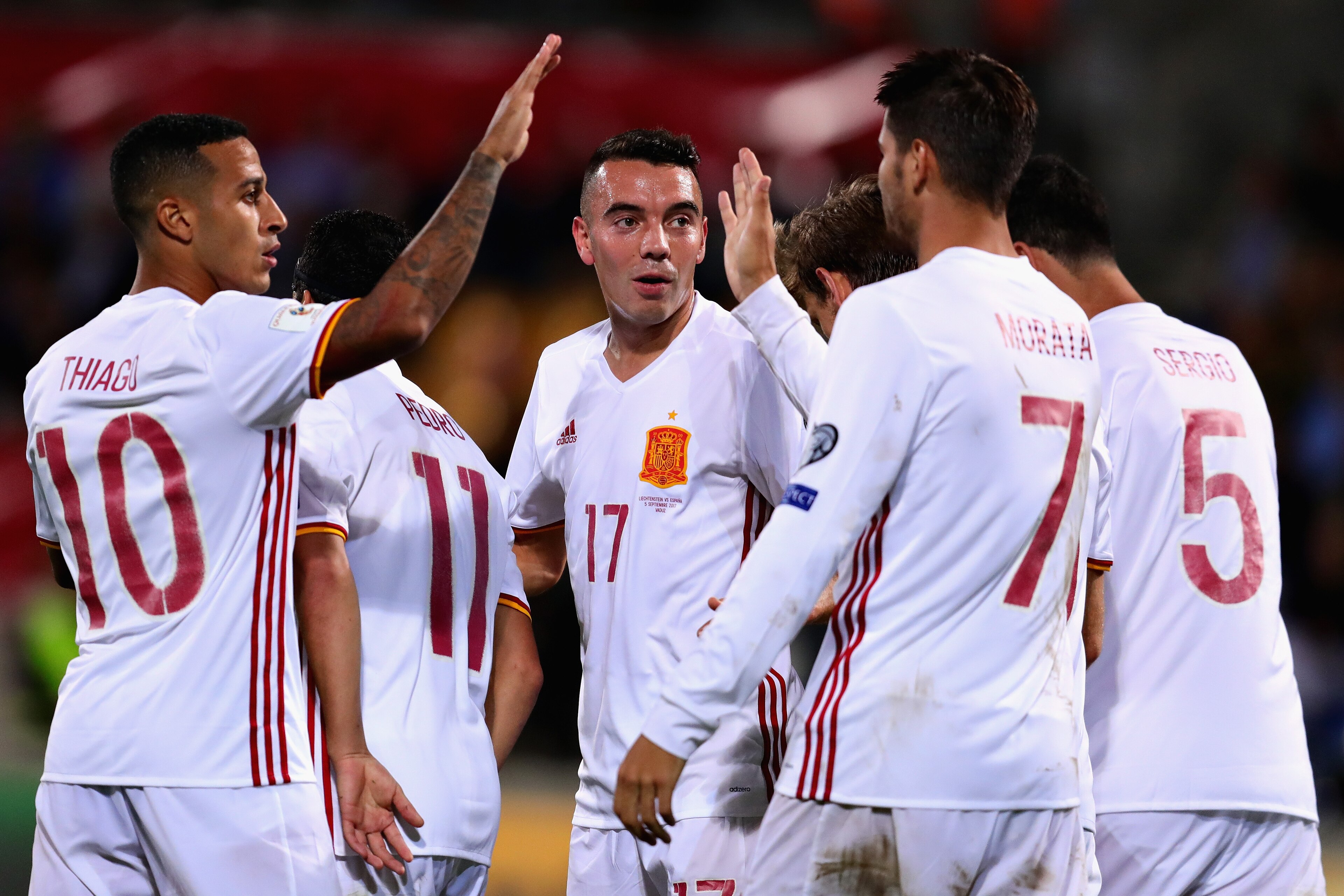 VADUZ, LIECHTENSTEIN - SEPTEMBER 05: Iago Aspas of Spain is congratulated by his teammates after scoring his sides fifth goal during the FIFA 2018 World Cup Qualifier between Liechtenstein and Spain at Rheinpark Stadion on September 5, 2017 in Vaduz, Lie VADUZ, LIECHTENSTEIN - SEPTEMBER 05: Iago Aspas of Spain is congratulated by his teammates after scoring his sides fifth goal during the FIFA 2018 World Cup Qualifier between Liechtenstein and Spain at Rheinpark Stadion on September 5, 2017 in Vaduz, Lie