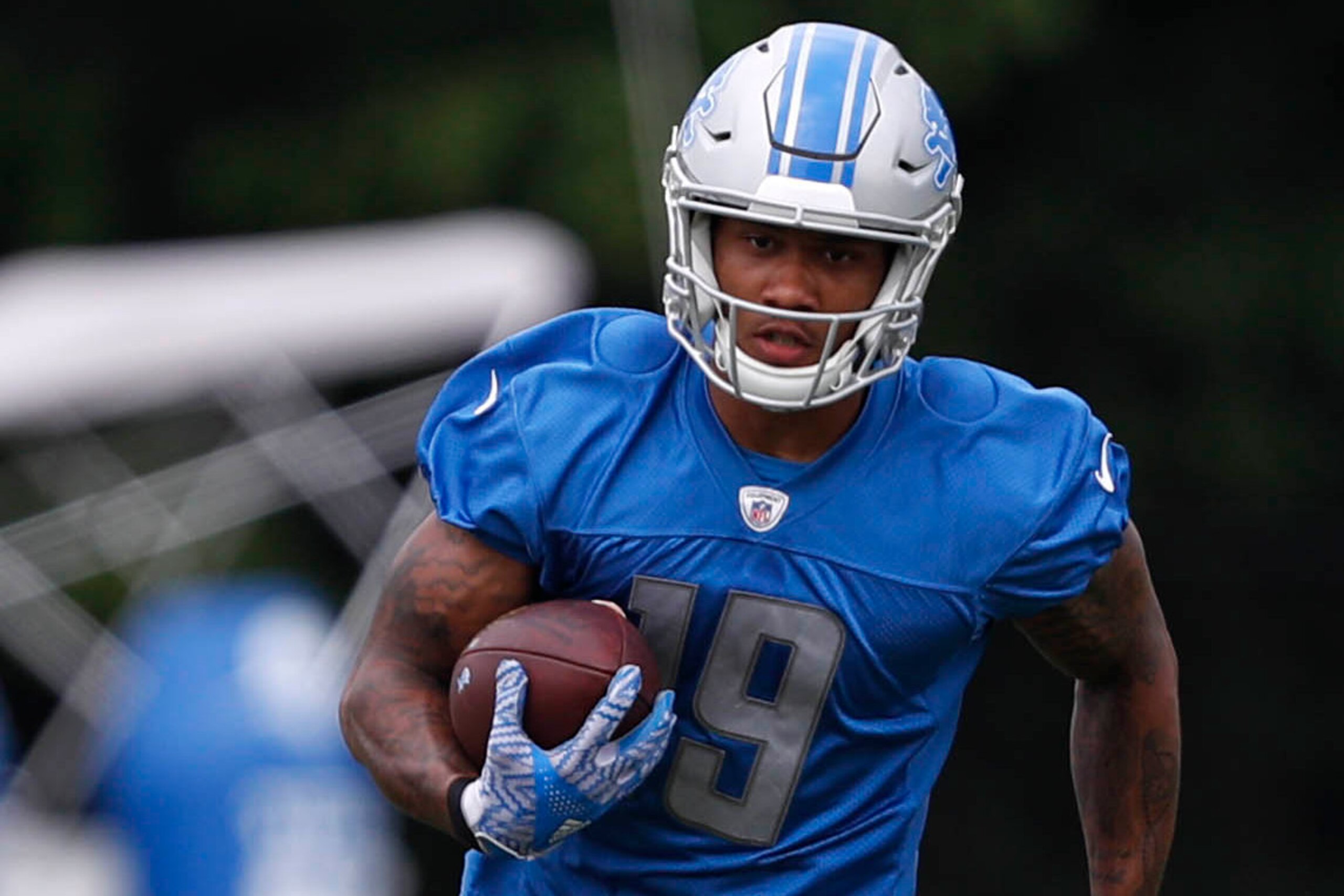 Jun 14, 2017; Allen Park, MI, USA; Detroit Lions wide receiver Kenny Golladay (19) runs after a catch during practice at Lions Headquarters and Training Facility. Mandatory Credit: Raj Mehta-USA TODAY Sports