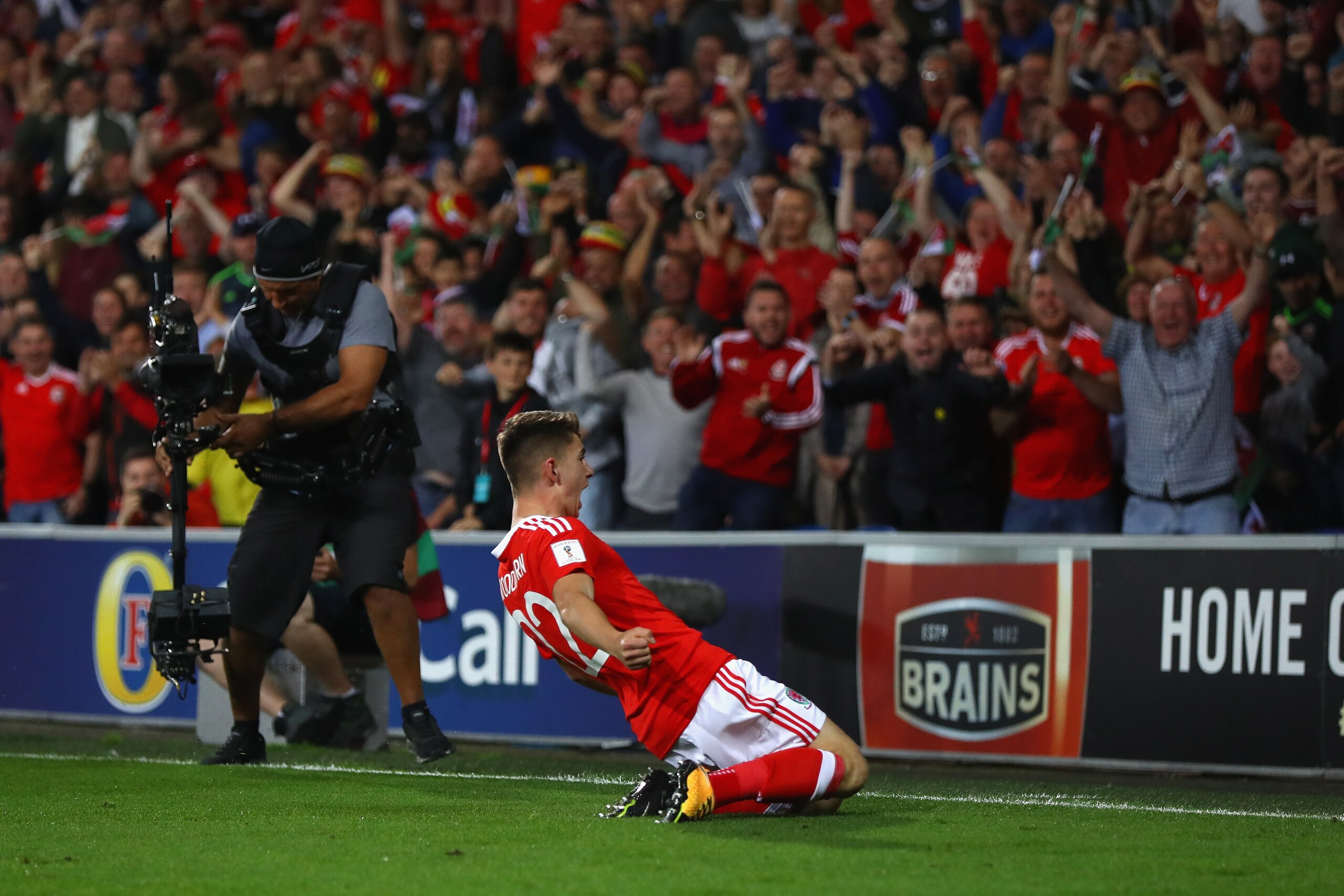 CARDIFF, WALES - SEPTEMBER 02:  Ben Woodburn of Wales celebrates scoring the winning goal during the FIFA 2018 World Cup Qualifier Group D match between Wales and Austria at Cardiff City Stadium on September 2, 2017 in Cardiff, Wales.  (Photo by Michael S