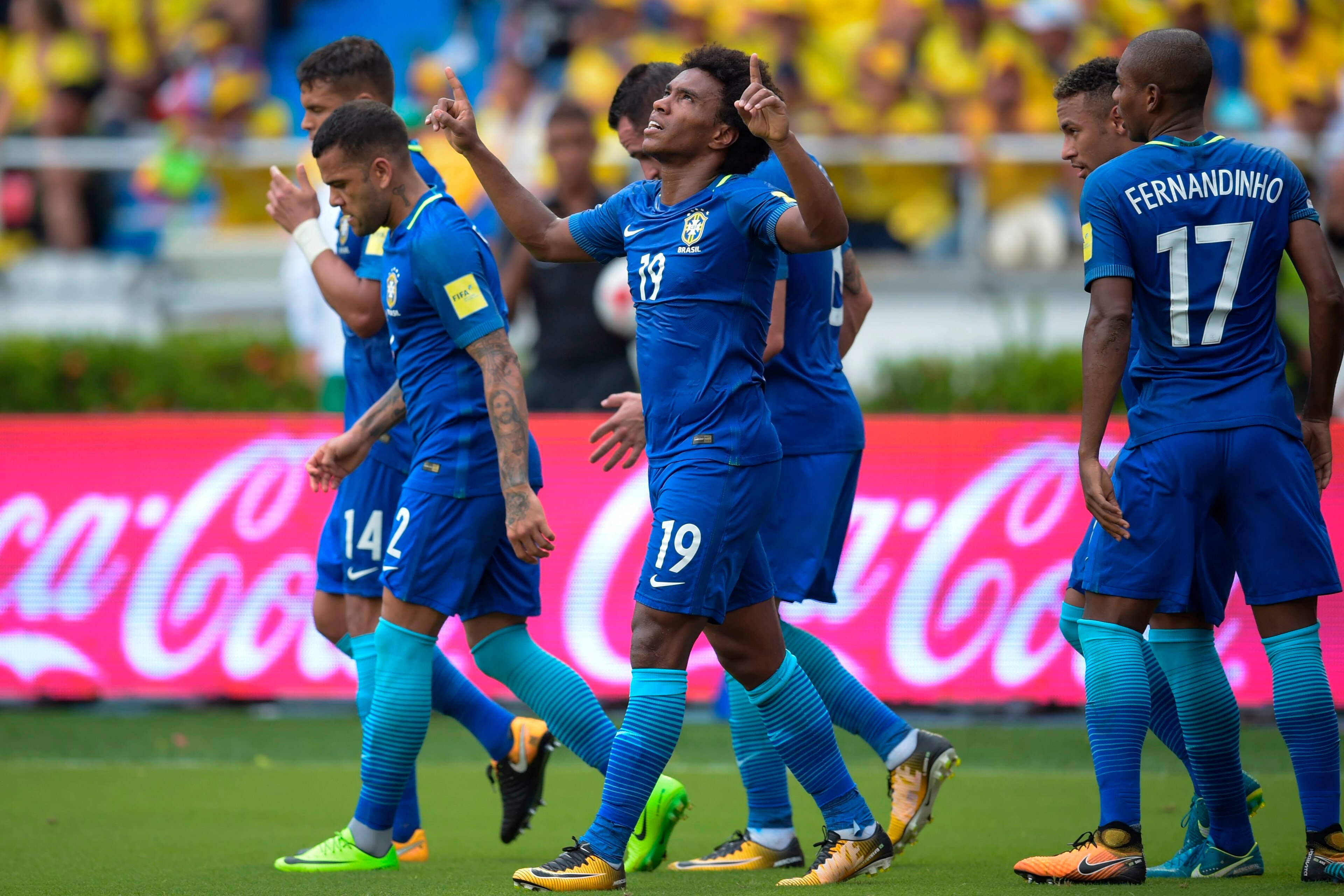 Brazil's Willian (C) celebrates after scoring against Colombia during their 2018 World Cup football qualifier match, in Barranquilla, Colombia, on September 5, 2017. / AFP PHOTO / Raul ARBOLEDA        (Photo credit should read RAUL ARBOLEDA/AFP/Getty Imag