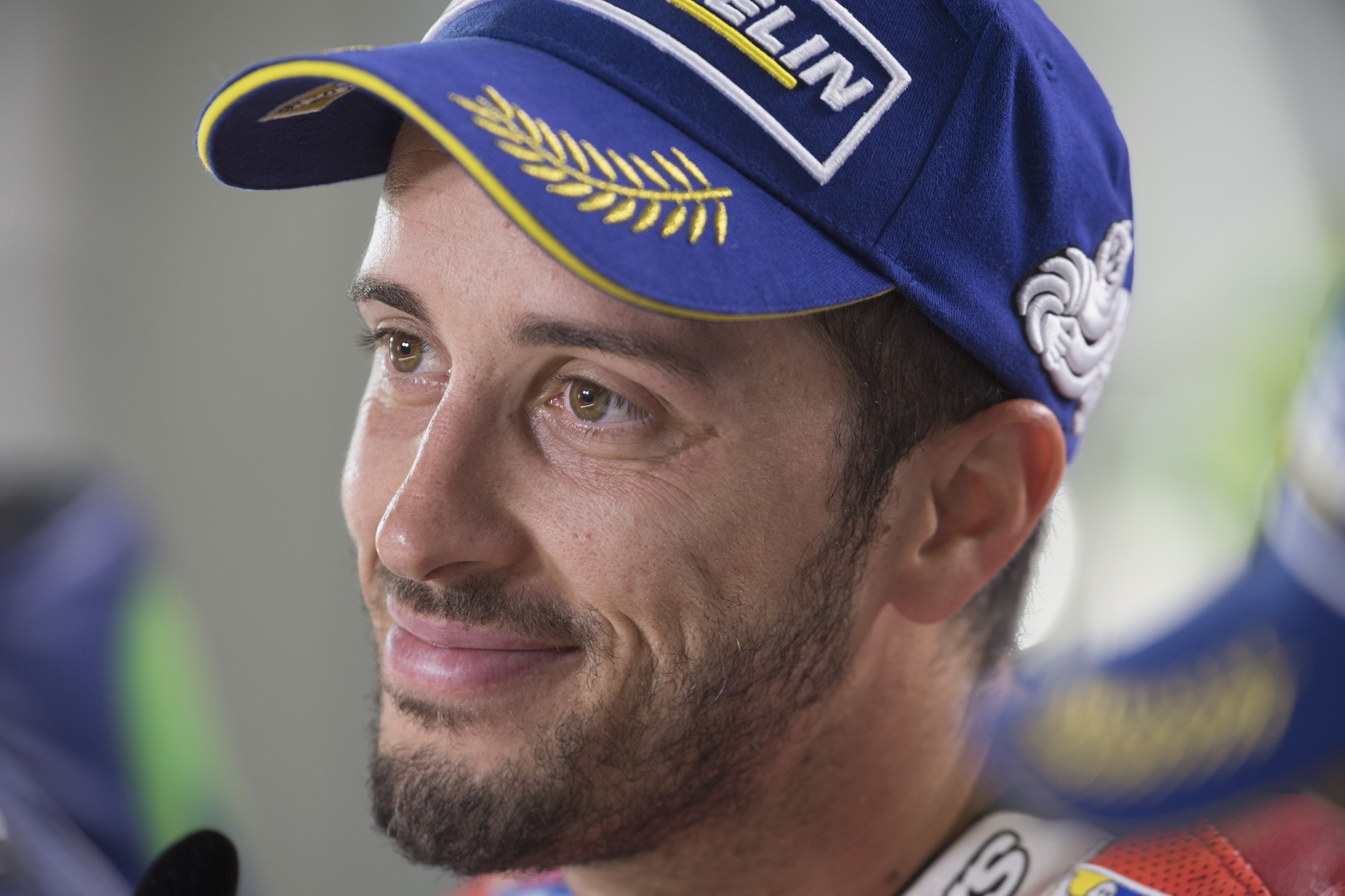 NORTHAMPTON, ENGLAND - AUGUST 27: Andrea Dovizioso of Italy and Ducati Team smiles during the press conference at the end of the MotoGP race during the MotoGp Of Great Britain - Race at Silverstone Circuit on August 27, 2017 in Northampton, England.  (Pho