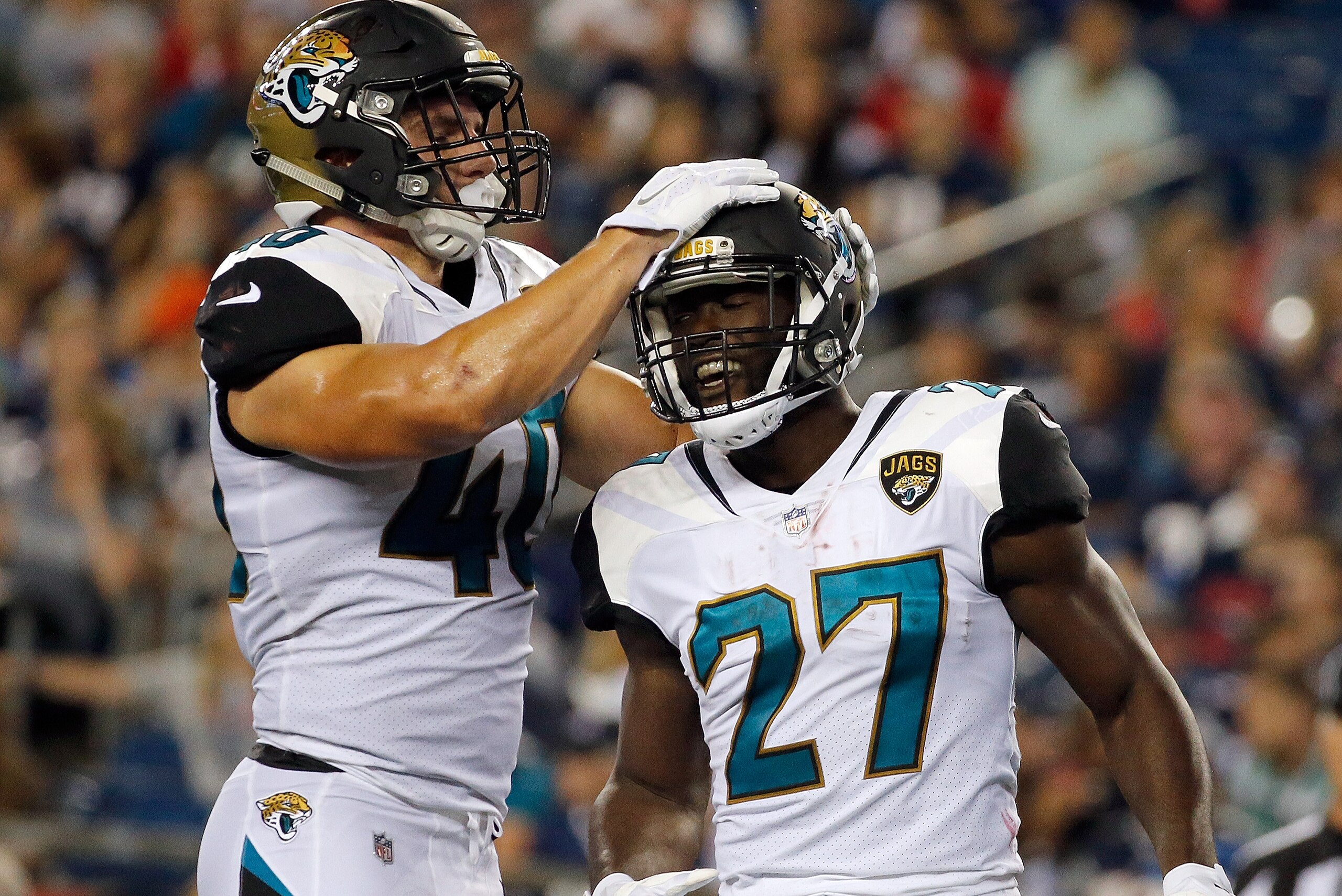 FOXBORO, MA - AUGUST 10: Leonard Fournette #27 of the Jacksonville Jaguars celebrates his touchdown with Tommy Bohanon #40 at the end of the second quarter against the New England Patriots during a preseason game at Gillette Stadium on August 10, 2017 in 