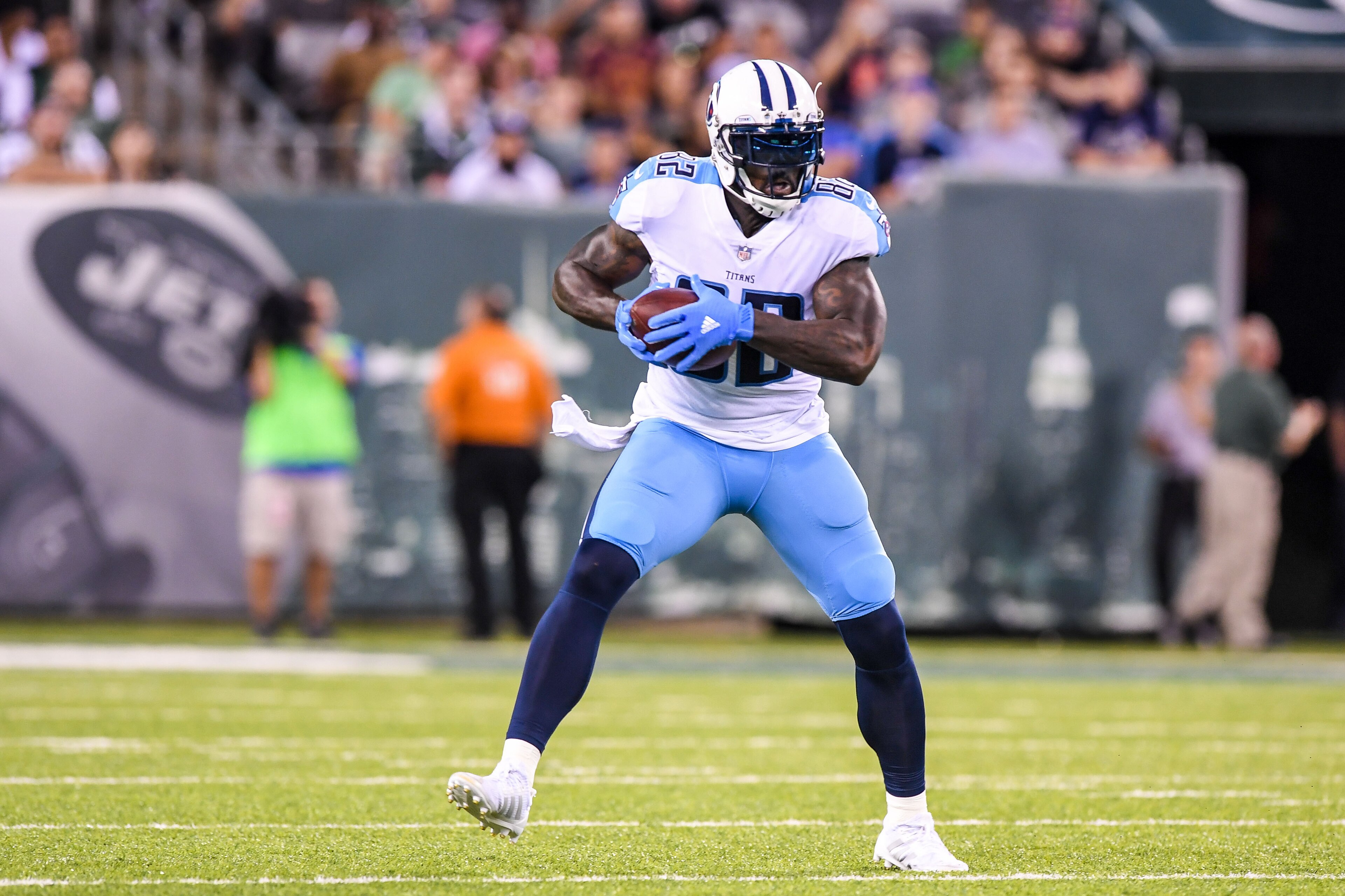 Aug 12, 2017; East Rutherford, NJ, USA; Tennessee Titans tight end Delanie Walker (82) runs the ball after making a reception against the New York Jets during the first quarter at MetLife Stadium. Mandatory Credit: Dennis Schneidler-USA TODAY Sports