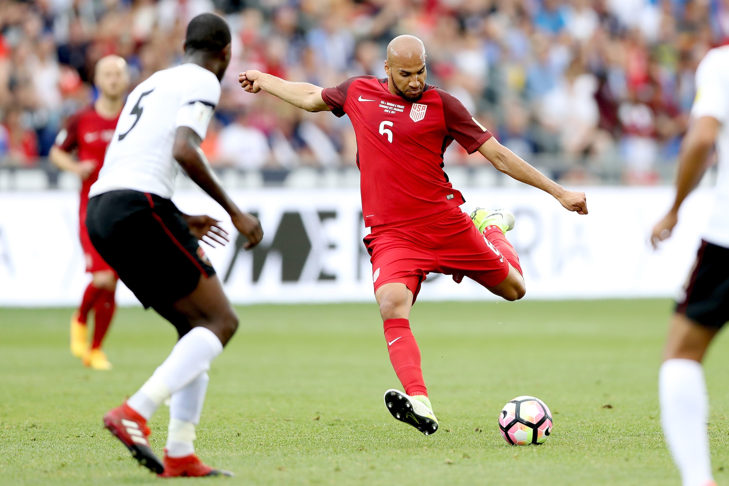 COMMERCE CITY, CO - JUNE 08:  John Brooks #6 of the U.S. National Team firs a shot on goal against Trinidad & Tabago in the first half during the FIFA 2018 World Cup Qualifier at Dick's Sporting Goods Park on June 8, 2017 in Commerce City, Colorado.  (Pho