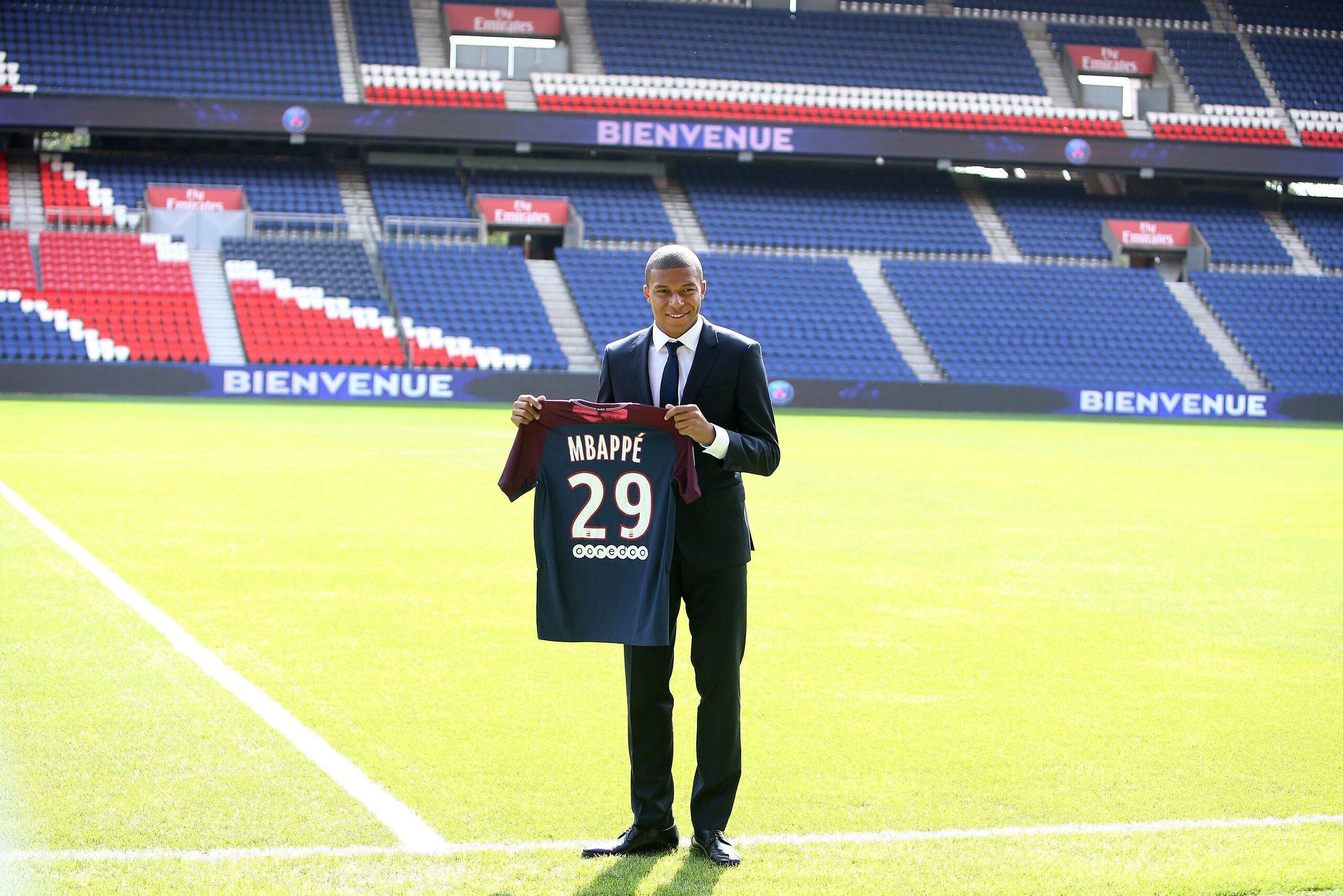 PARIS, FRANCE - SEPTEMBER 6: Kylian Mbappe is presented as new player of Paris Saint Germain by President of PSG Nasser Al Khelaifi at Parc des Princes on September 6, 2017 in Paris, France. (Photo by Jean Catuffe/Getty Images)